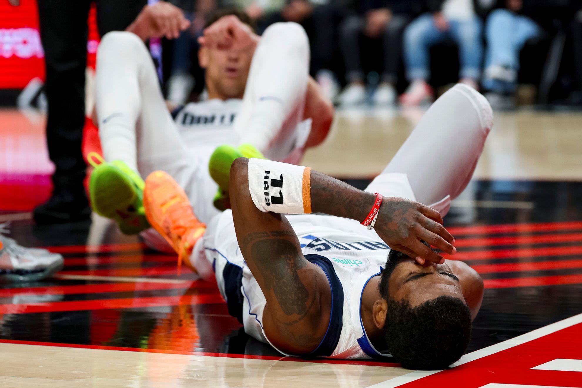 Kyrie Irving suffers foot injury after collision with Mavericks teammate