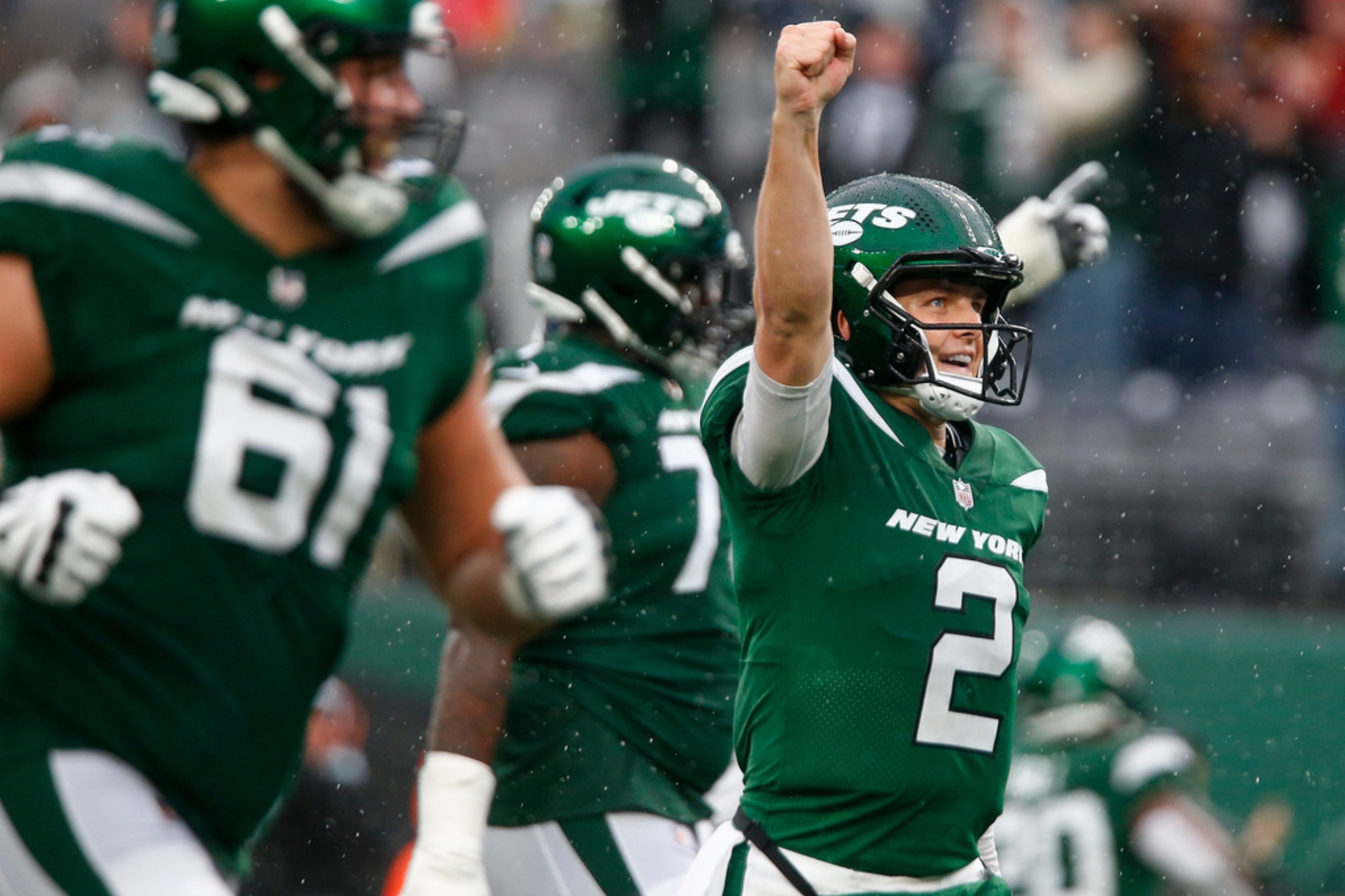 New York Jets quarterback Zach Wilson (2) celebrates after a touchdown against the Houston Texans during the second half of an NFL football game