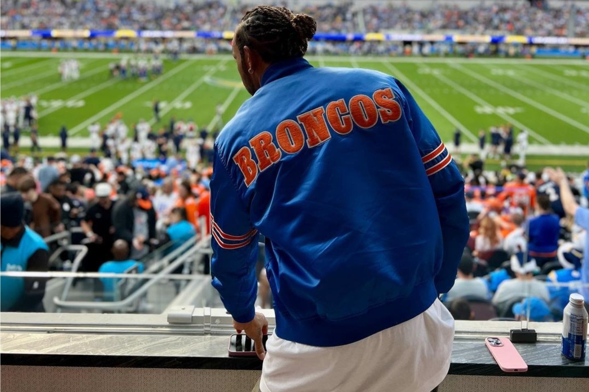 Formula 1 legend Lewis Hamilton at the Broncos-Chargers game.