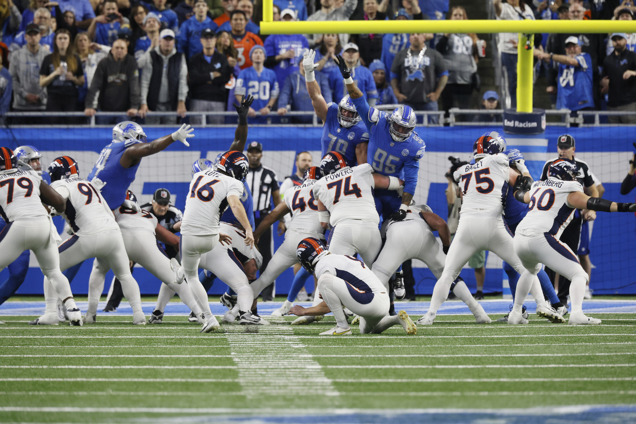 Denver Broncos place-kicker Wil Lutz (16) kicks a field goal during the second half of an NFL football game against the Detroit Lions