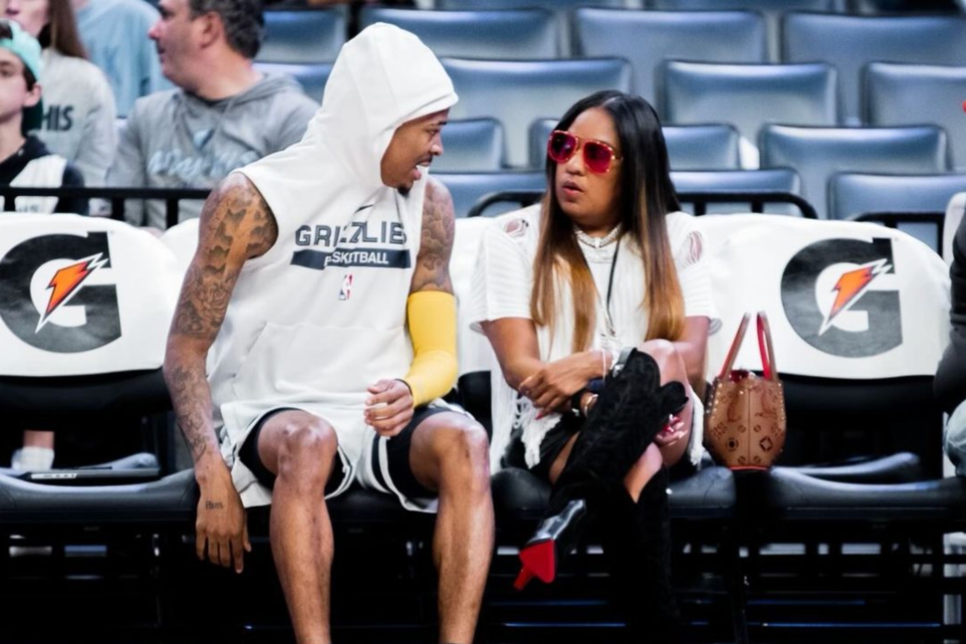 Image of Ja Morant with his mother courtside