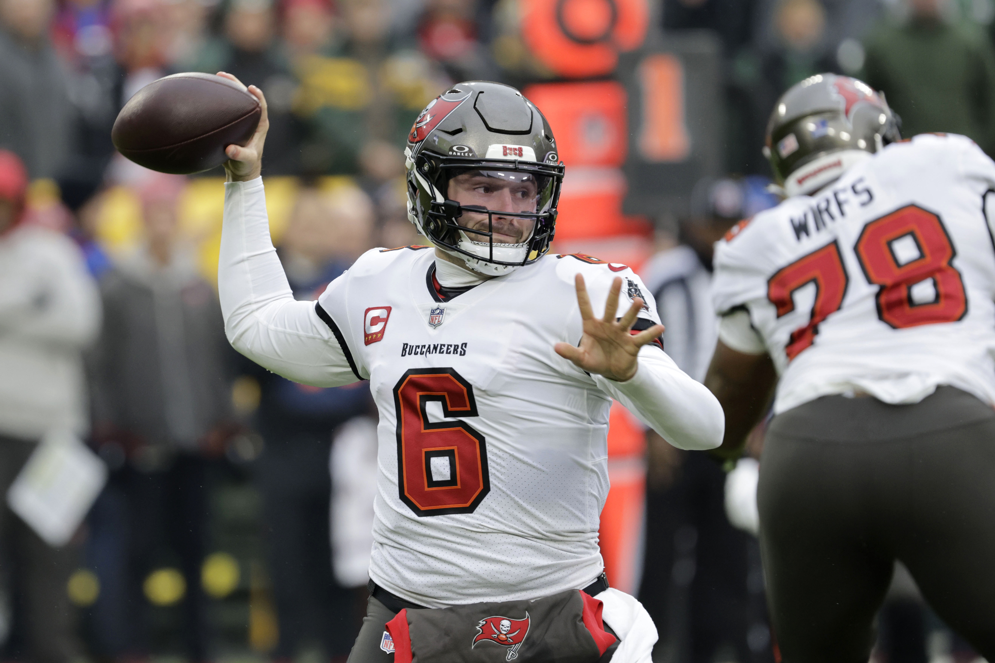Tampa Bay Buccaneers quarterback Baker Mayfield (6) throws a pass during the first half of an NFL football game against the Green Bay Packers, Sunday, Dec. 17, 2023, in Green Bay, Wis. (AP Photo/Mike Roemer)