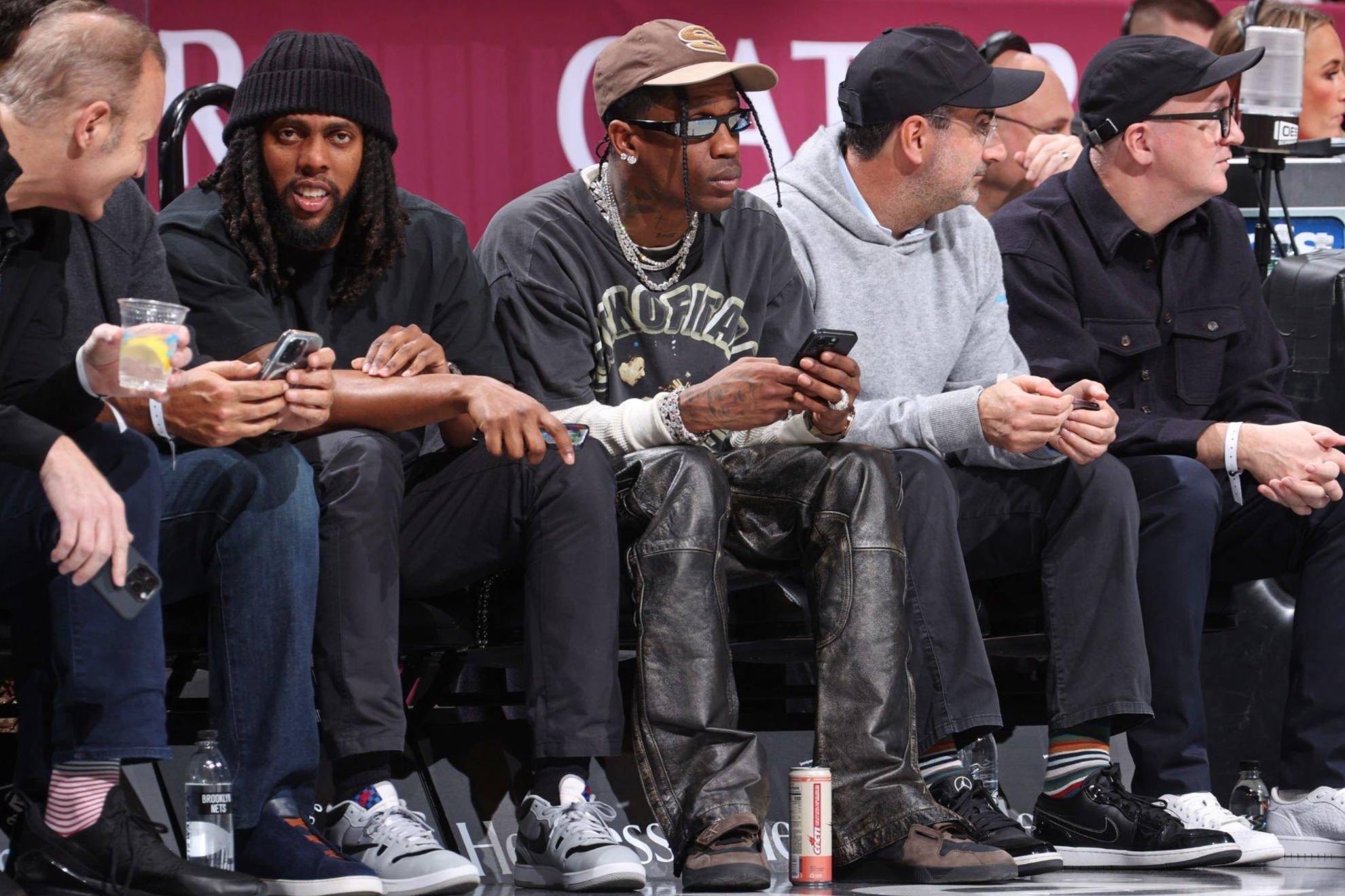 Travis Scott at Barclays Center during a Nets vs Knicks game.