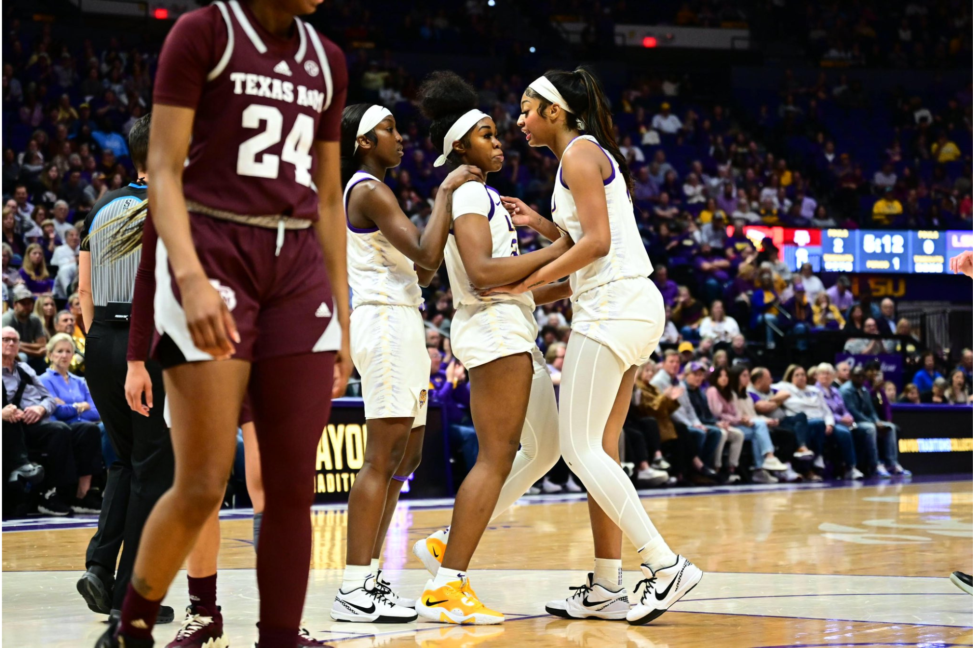 Angel Reese communicates with her LSU teammates.