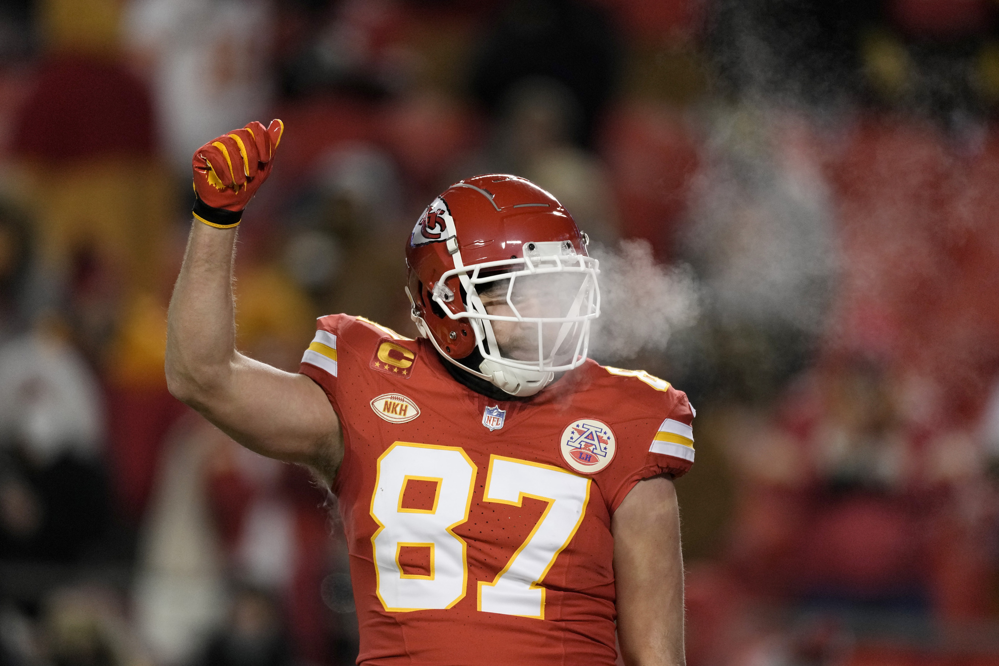 Travis Kelce endured the cold on Saturday nights NFL Wild Card game against the Dolphins.