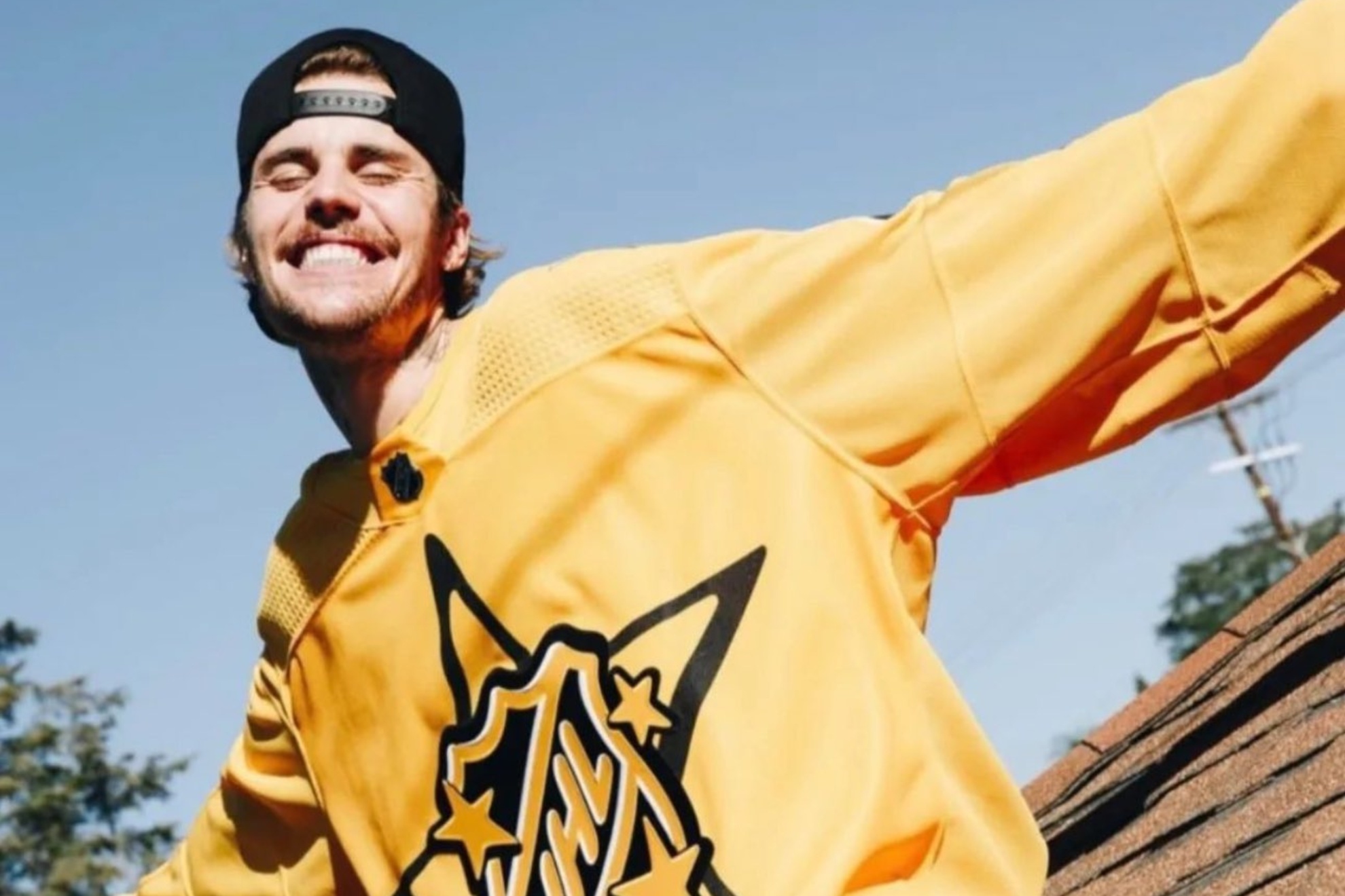 Justin Bieber donning one of the jerseys he designed for the NHL.
