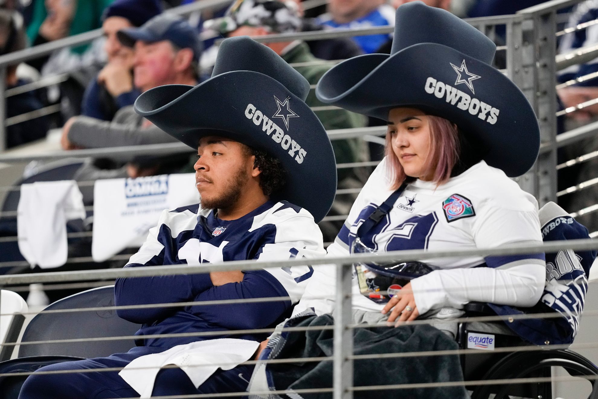 Cowboys fans leave AT&T Stadium in droves before the fourth quarter vs. Packers