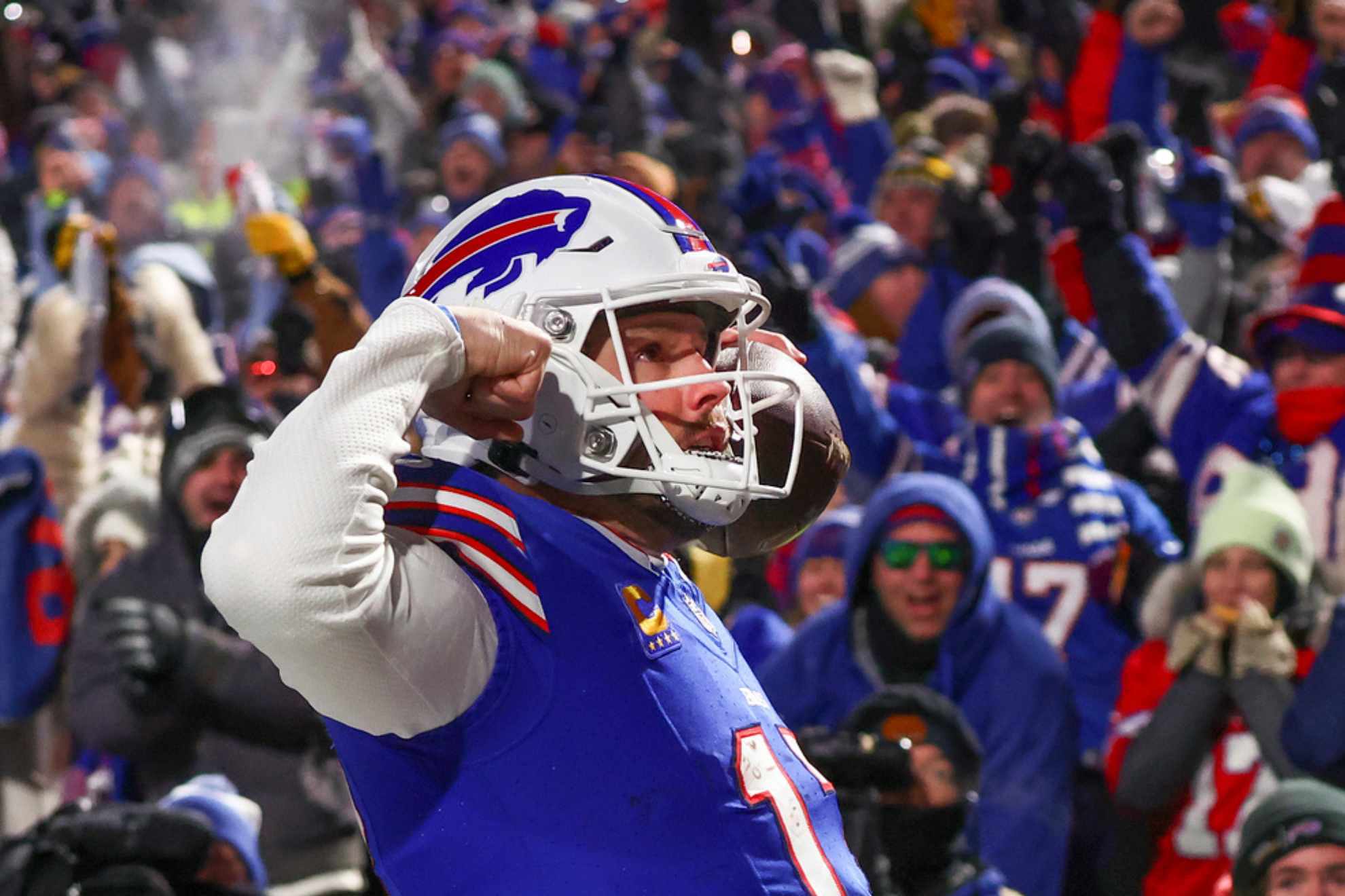 Josh Allen reacts to the crowd after scoring a touchdown against the Pittsburgh Steelers /