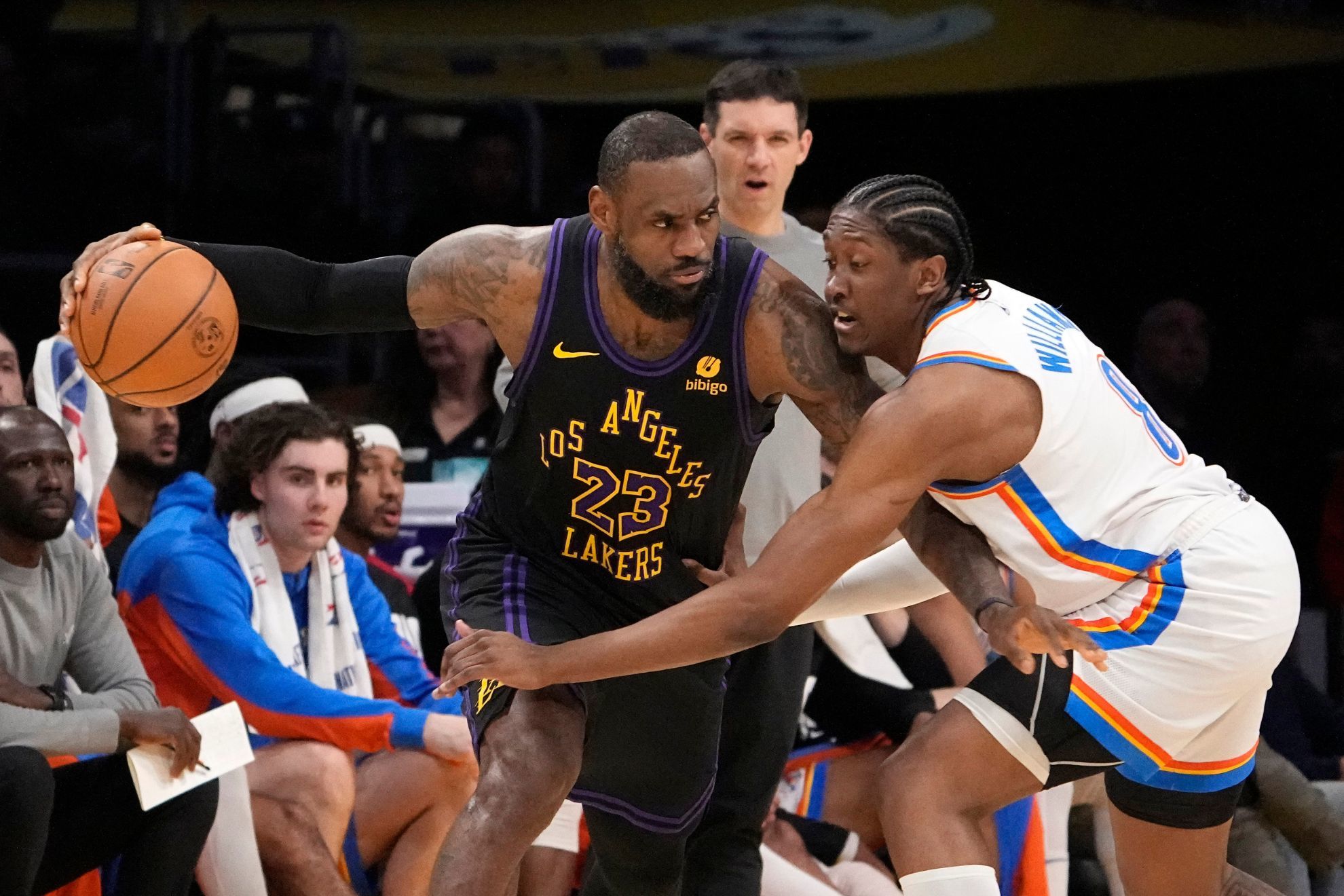LeBron James visibly upset after fan hugs him on Lakers bench in win vs. Thunder