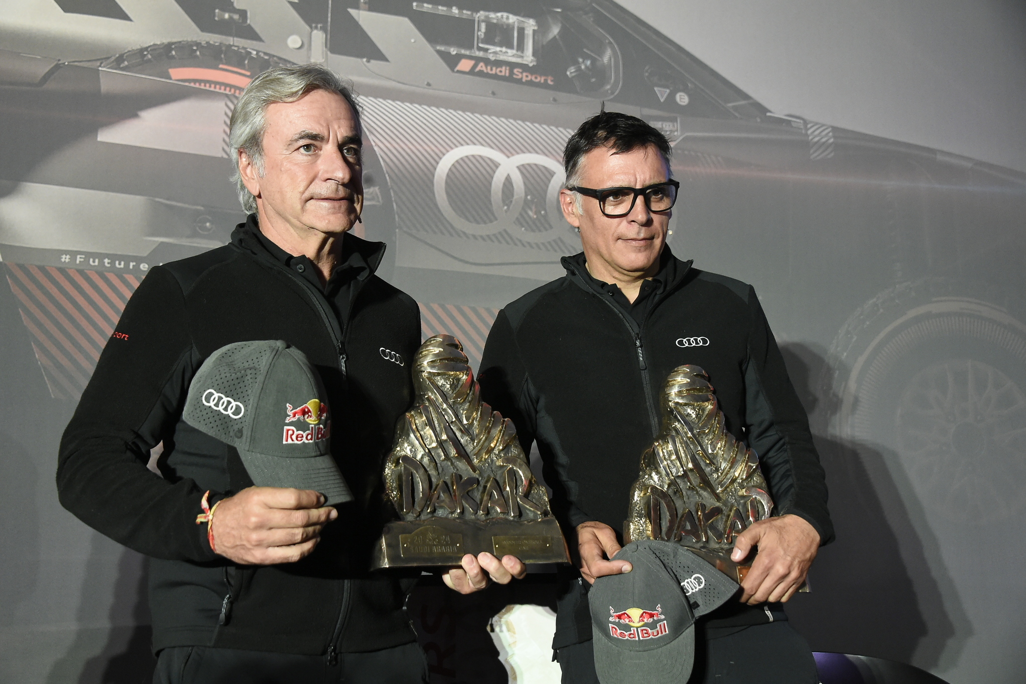 Carlos Sainz y Lucas Cruz, hoy en Madrid en el acto de Audi España.