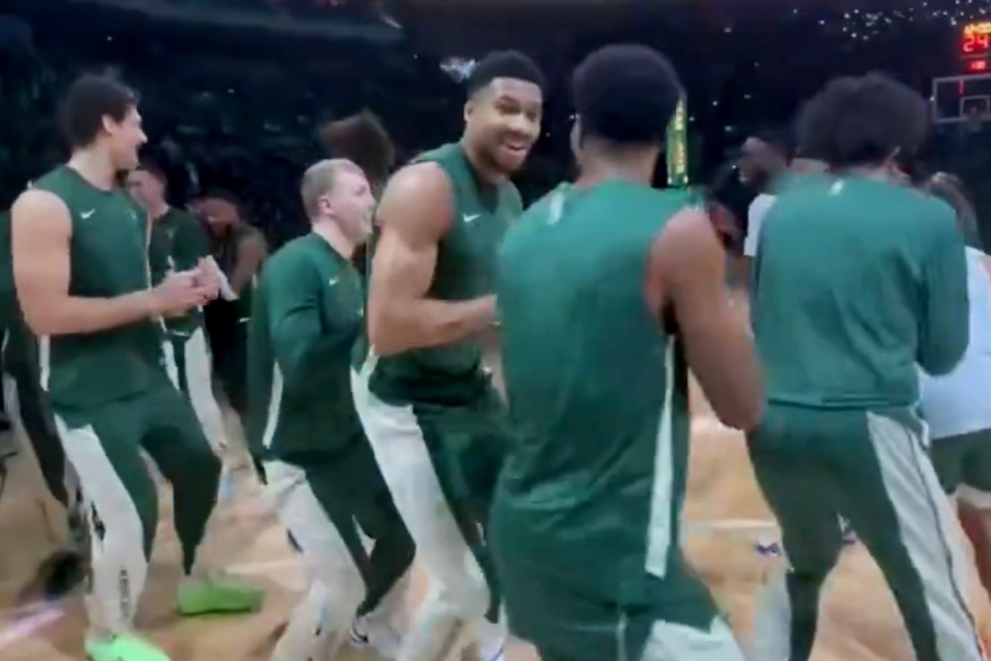 Giannis and the Bucks players before their first game without Adrian Griffin.