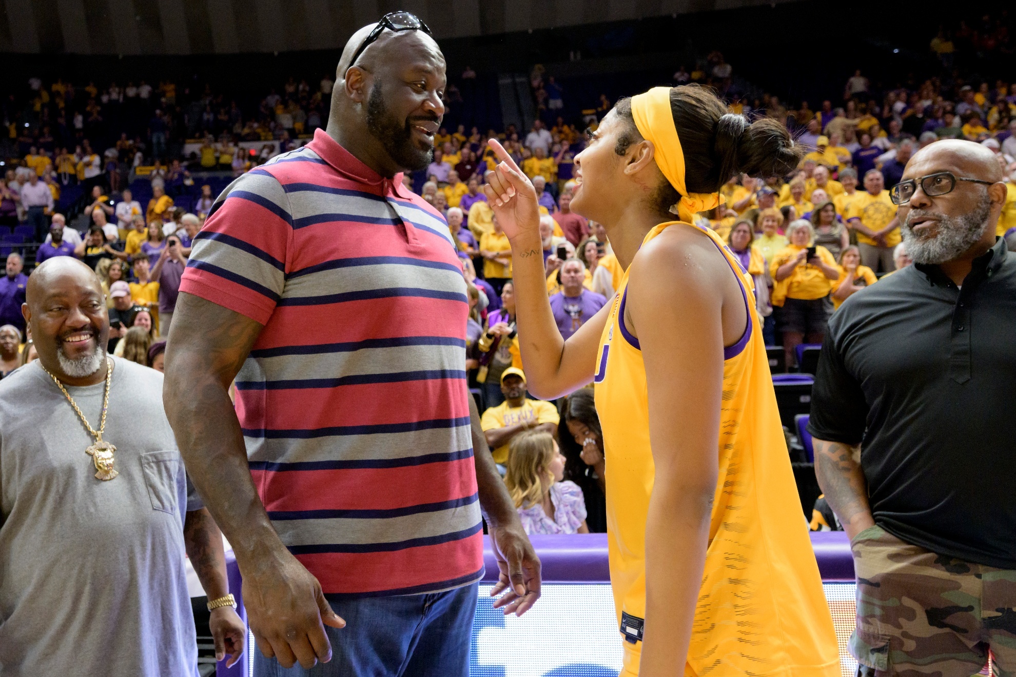 Shaq and Angel Reese during an LSU game