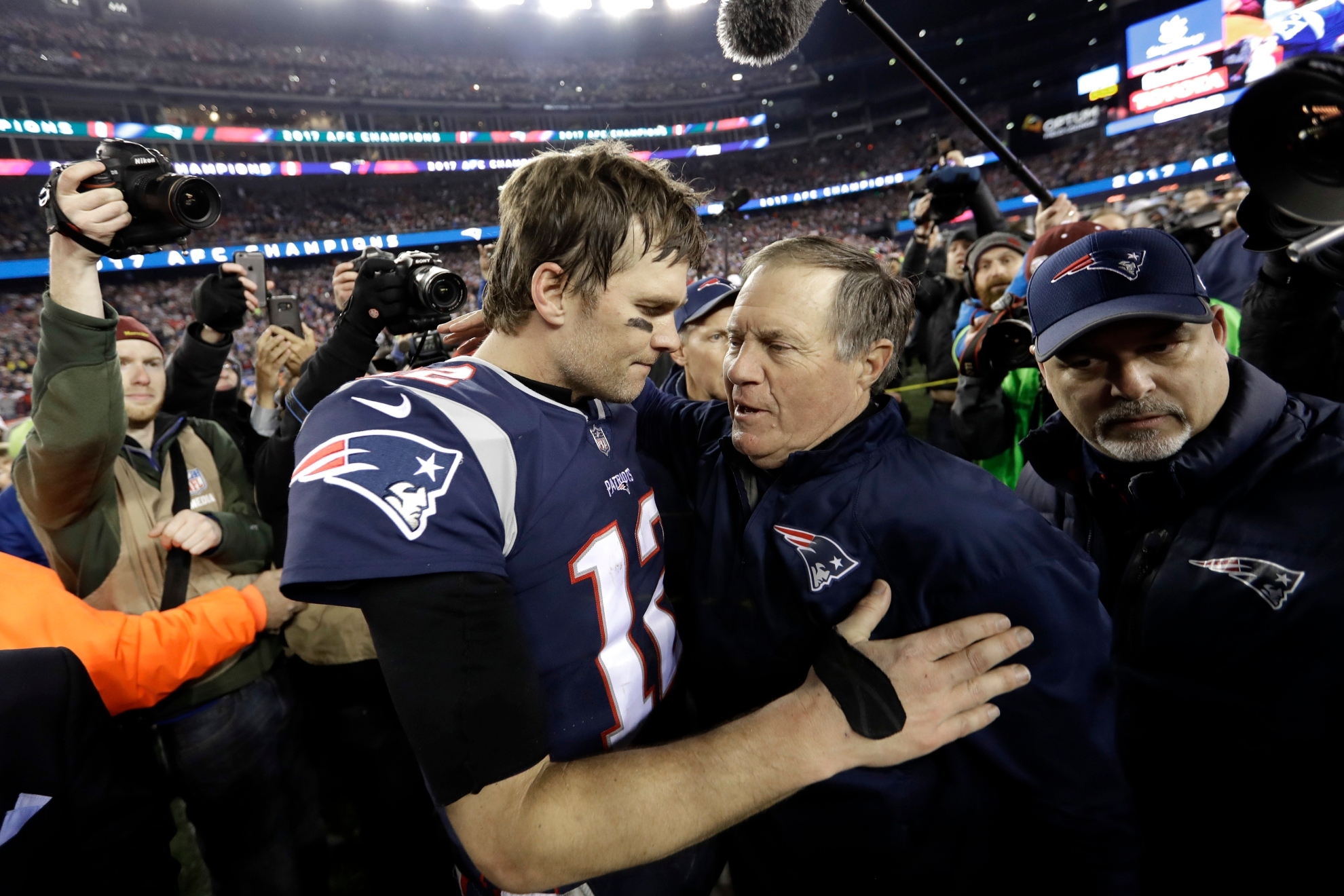 Tom Brady greets Bill Belichick