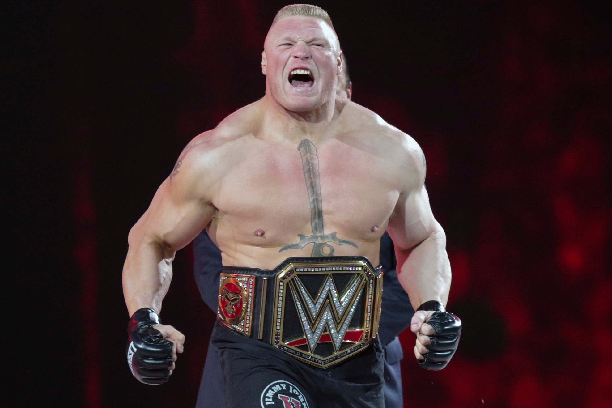 Brock Lesnar with the WWE champions belt