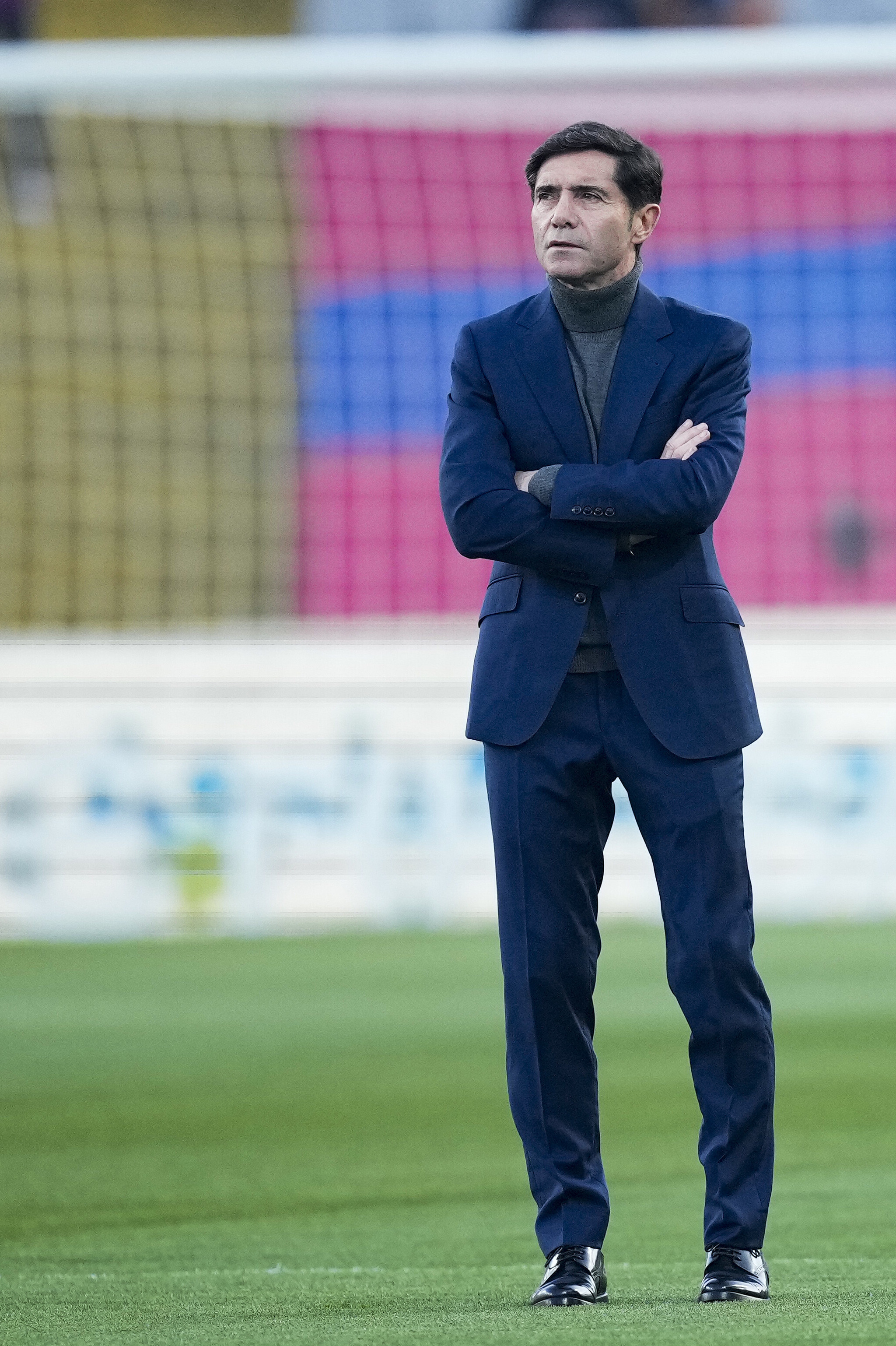 Villarreal coach Marcelino steps onto the pitch ahead of tonight's match
