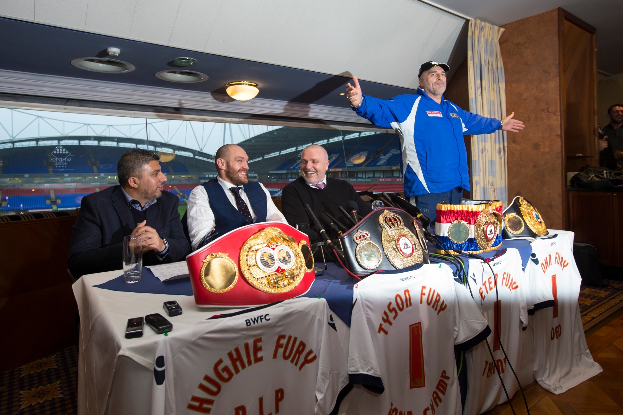 Tyson and John Fury at a press conference