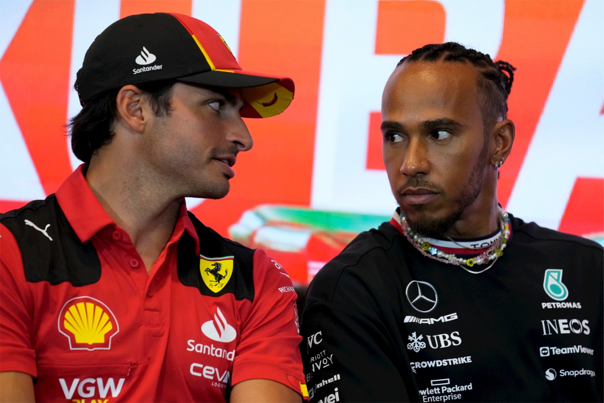 Formula 1 drivers Carlos Sainz (Ferrari) and Lewis Hamilton (Mercedes).