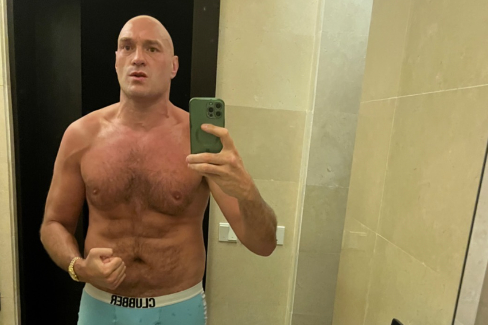 Tyson Fury showing his physique