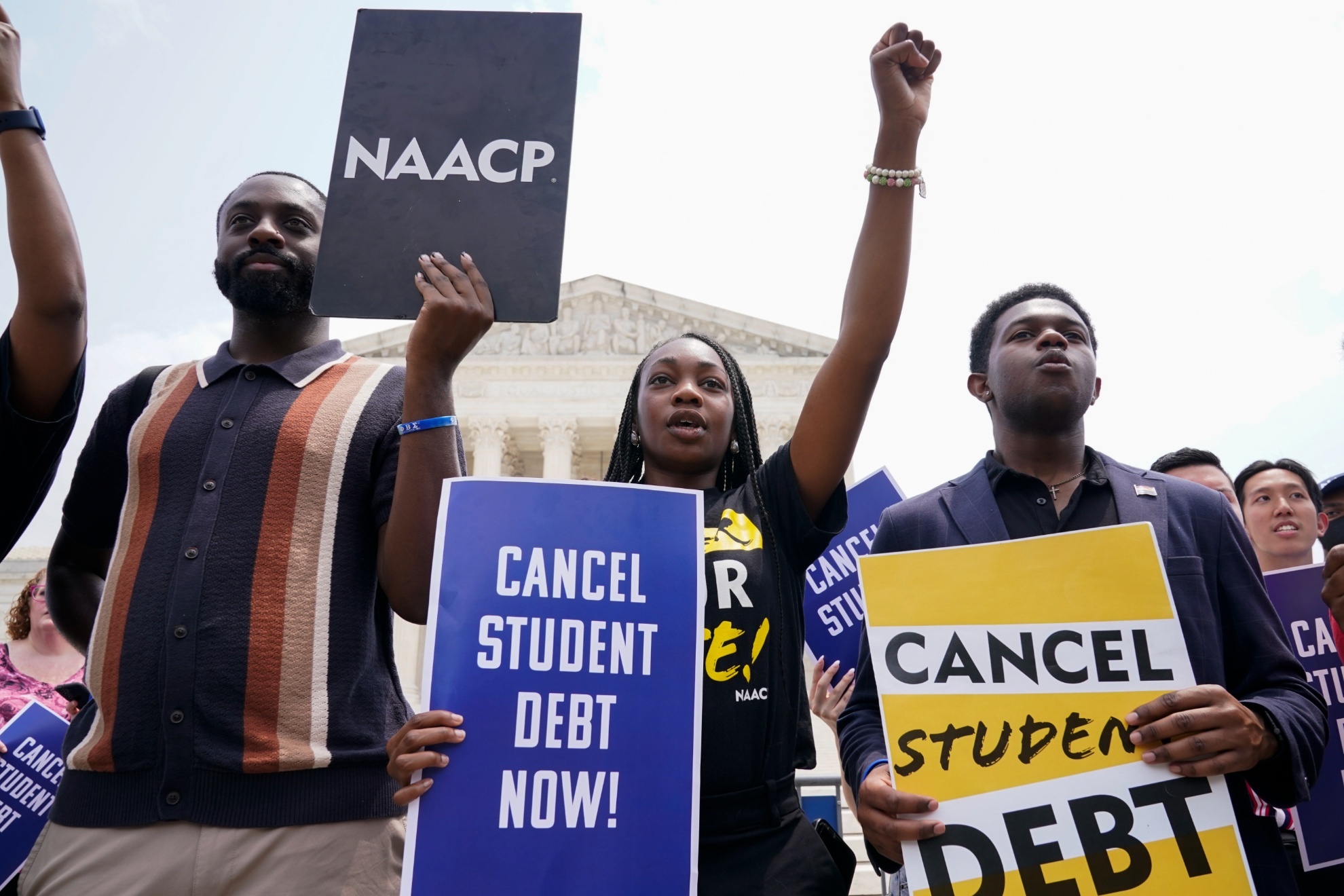 Protesters outside in Washington call for the cancellation of student debt.