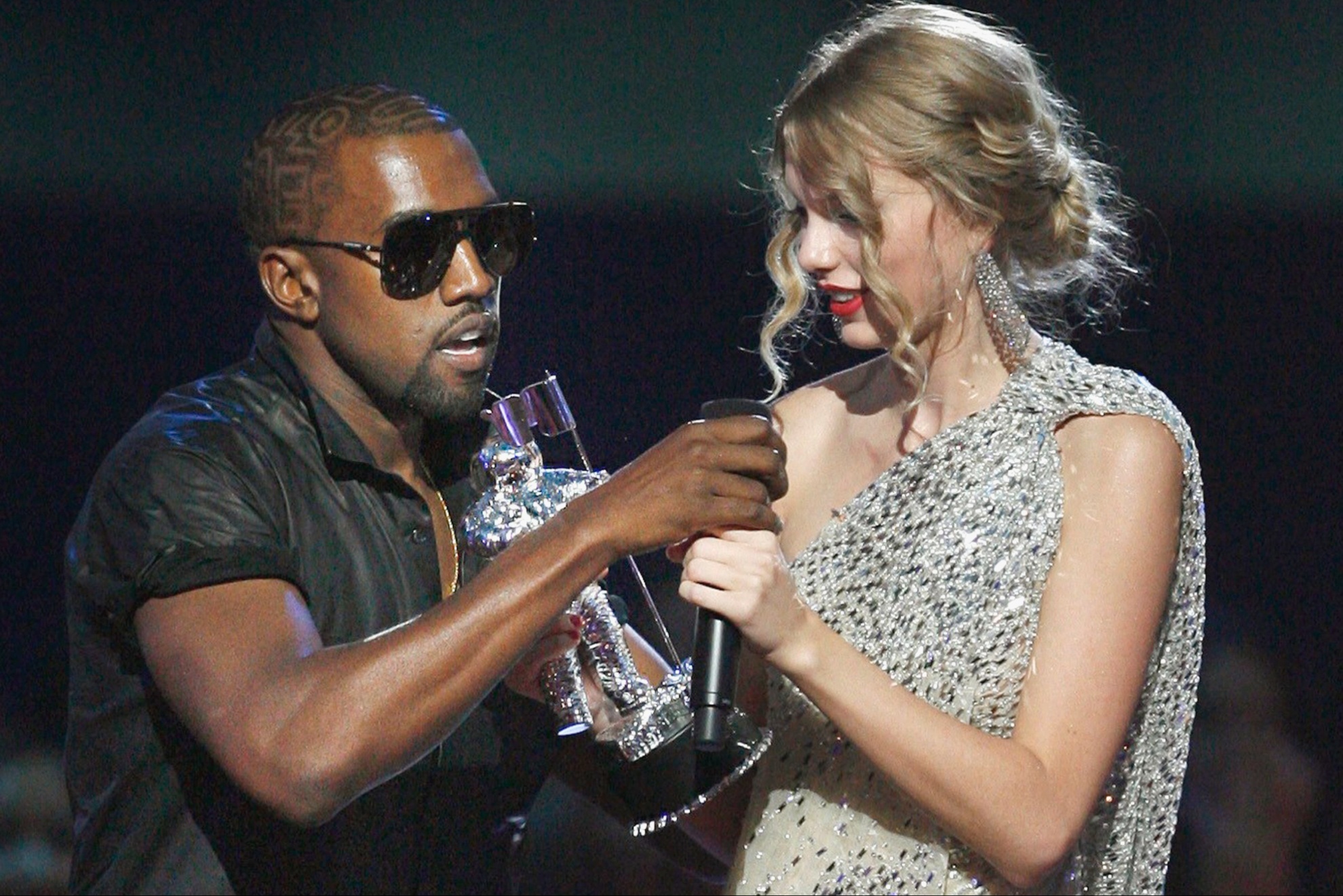 The moment Kanye West takes the microphone from Taylor Swift at the MTV VMAs in 2009.
