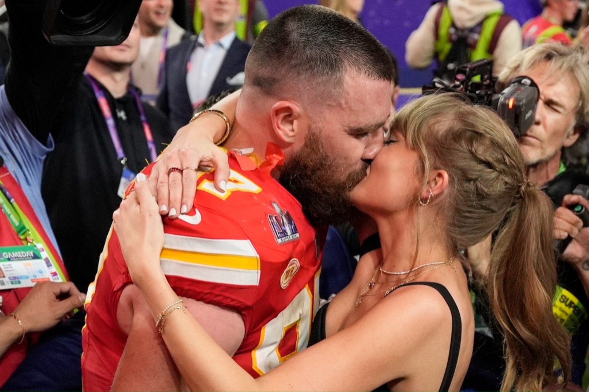 Travis Kelce and Taylor Swift celebrating the Chiefs victory in the Super Bowl.
