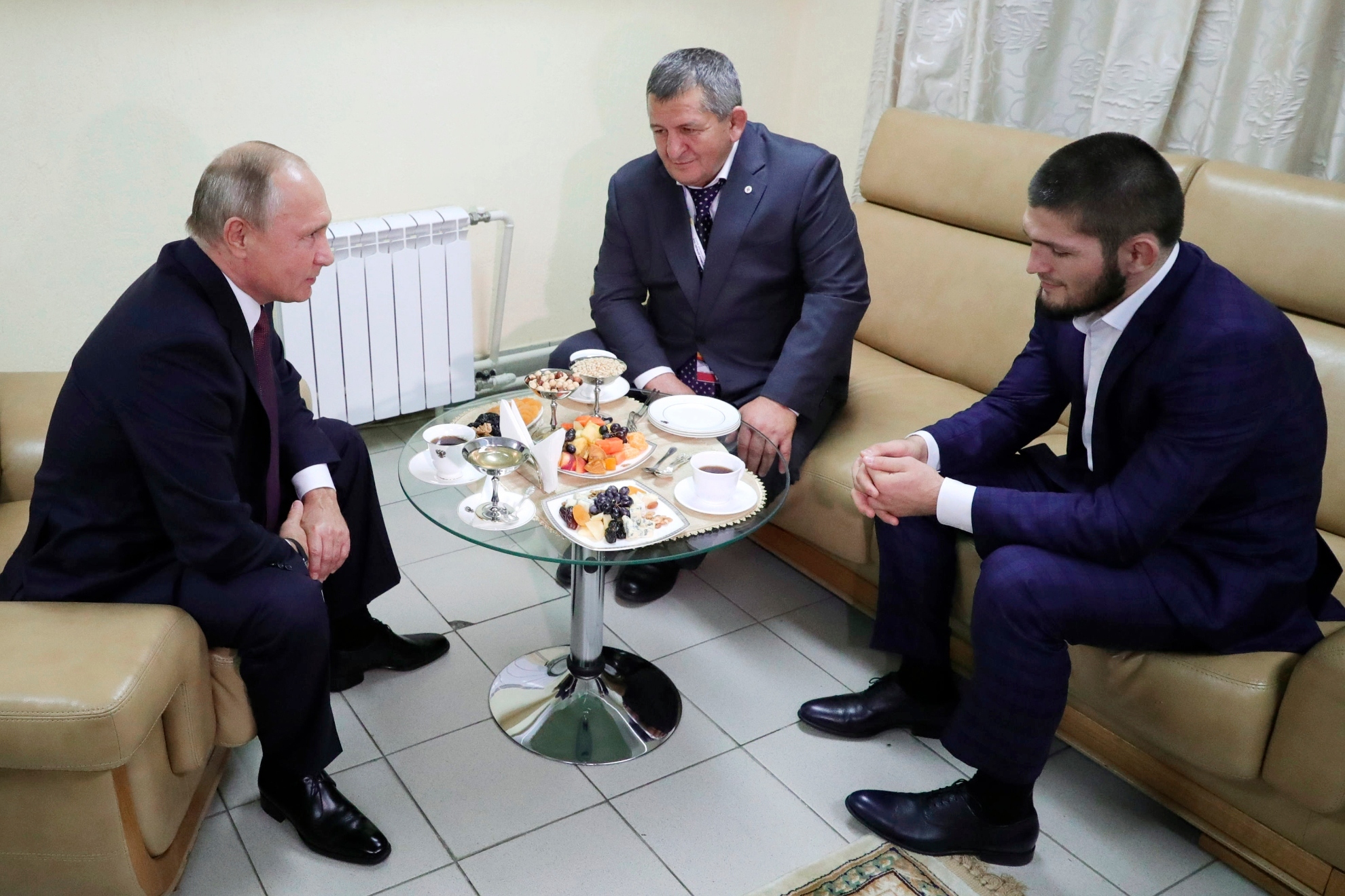 Khabib Nurmagomedov and Vladimir Putin at a meeting