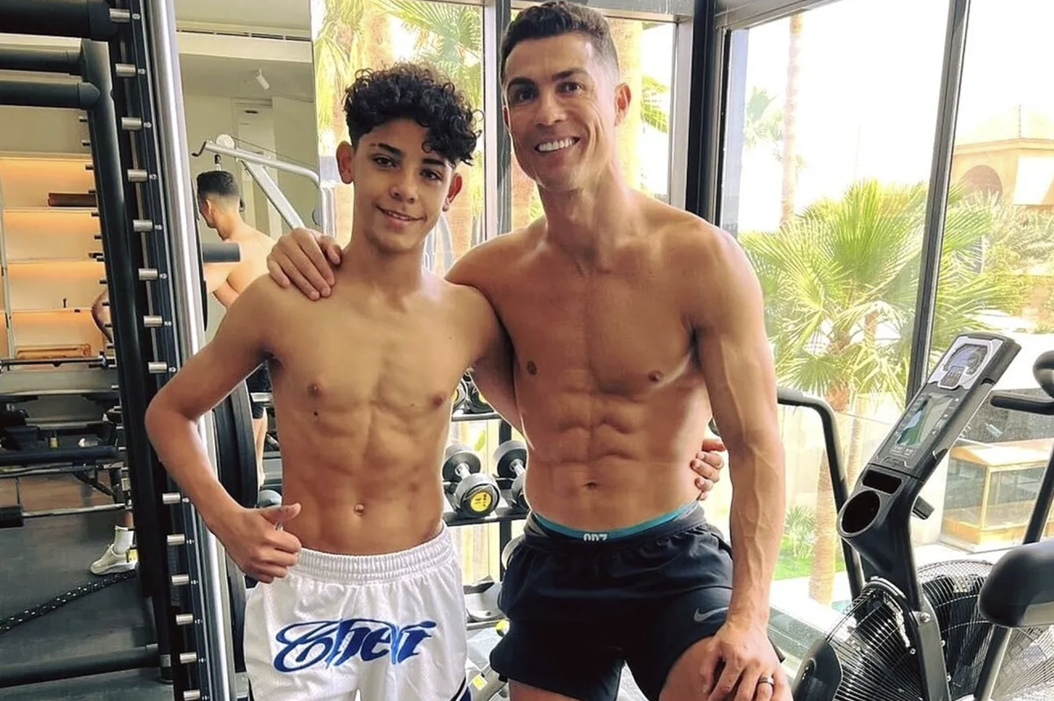 Cristiano Ronaldo and his son show off some serious abs in the gym