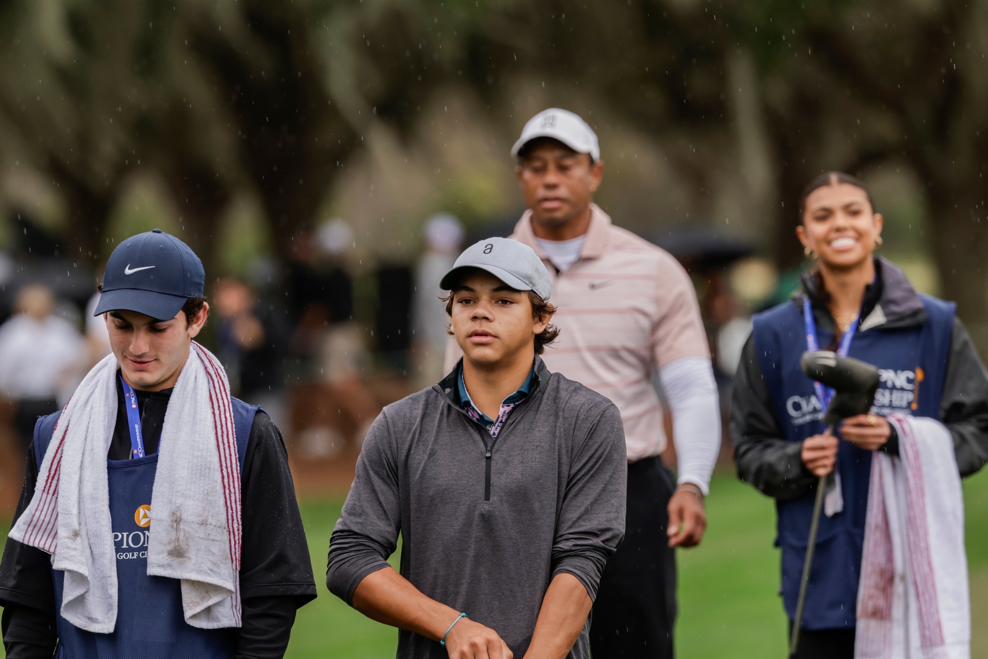 Tiger Woods watches his son Charlie compete