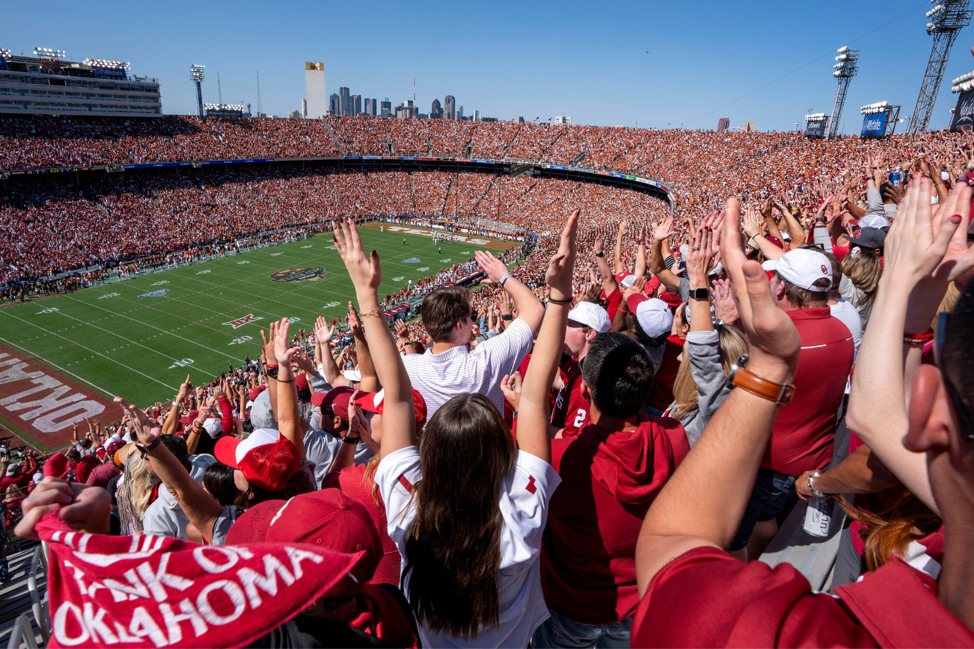 Oklahoma Sooners fans celebrate a touchdown.