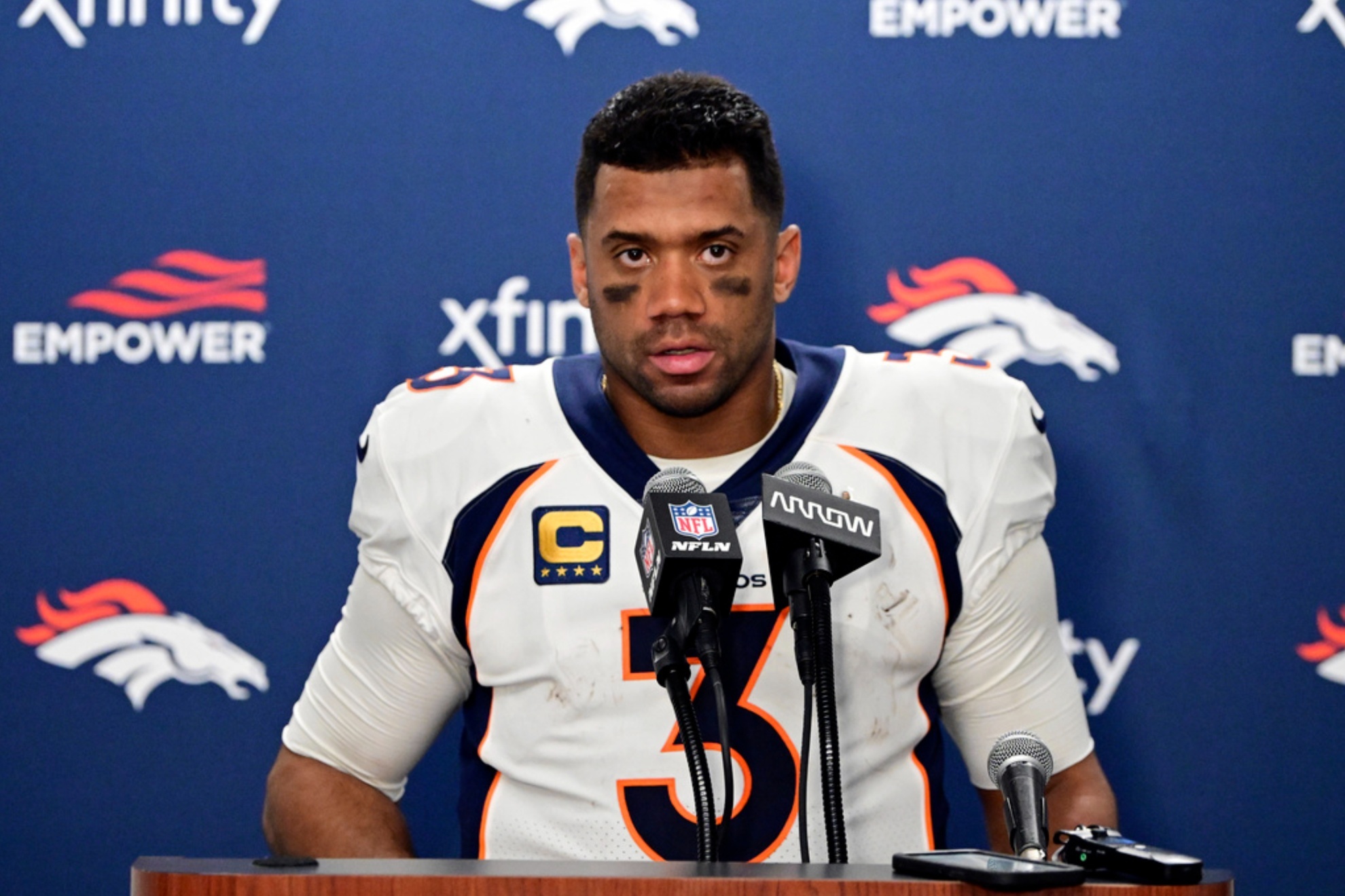 Russell Wilson addresses the media after the game against the Lions in Dec.
