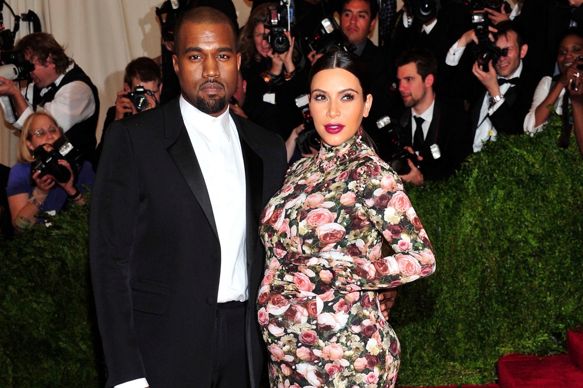 Kanye West and Kim Kardashian at an event