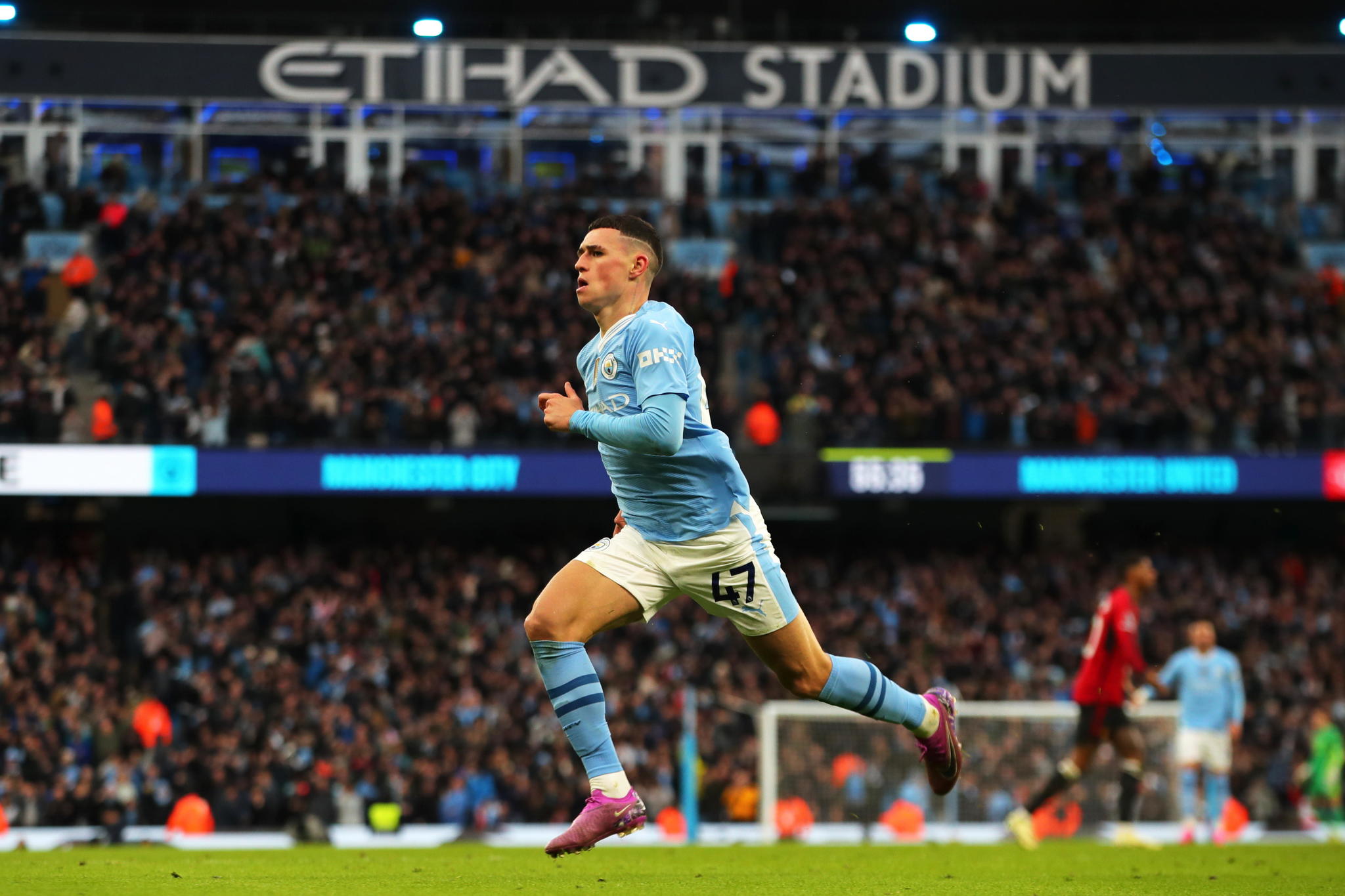 Phil Foden of Manchester City celebrates scoring his teams first goal