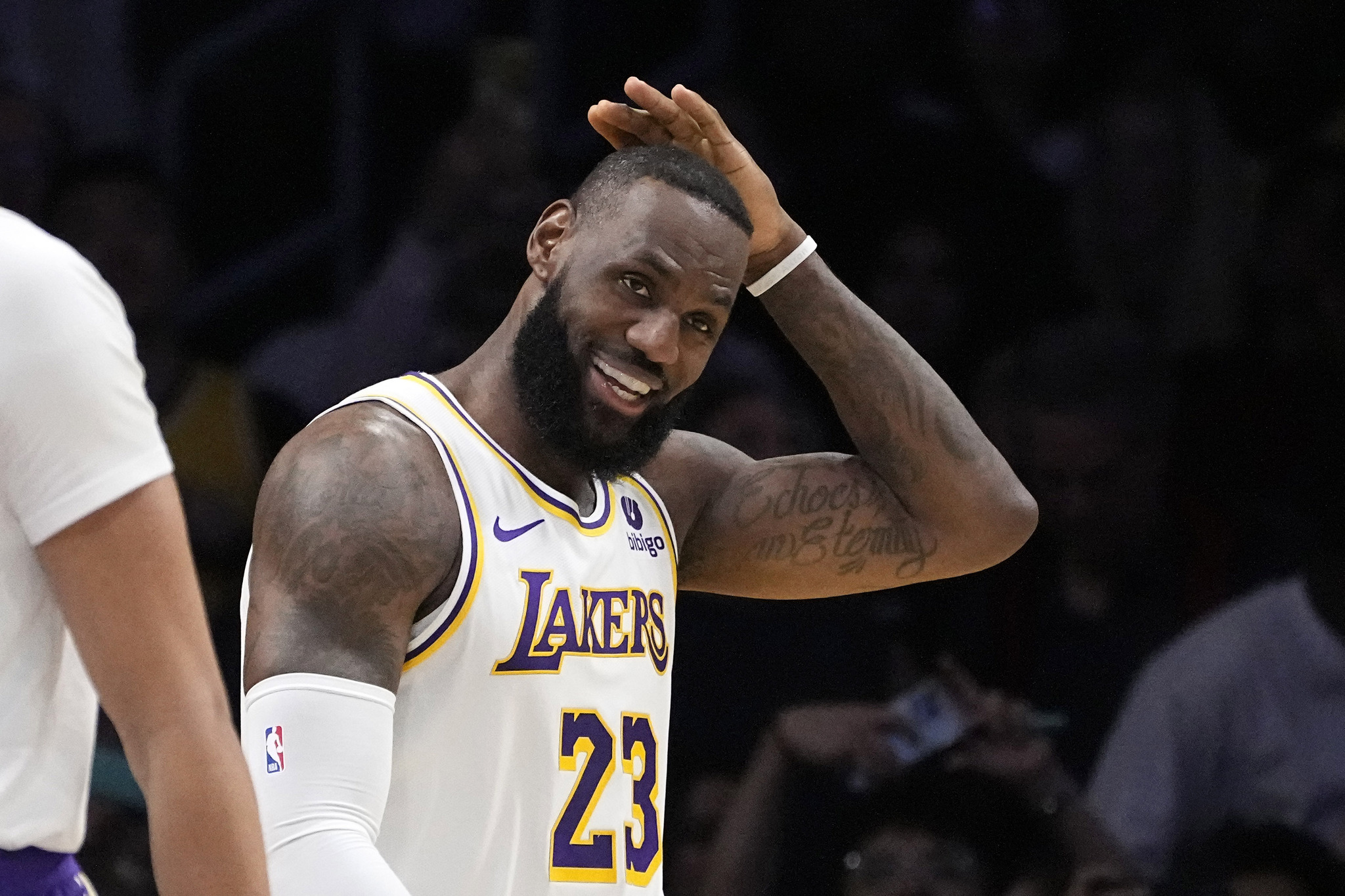 Los Angeles Lakers forward LeBron James smiles after scoring
