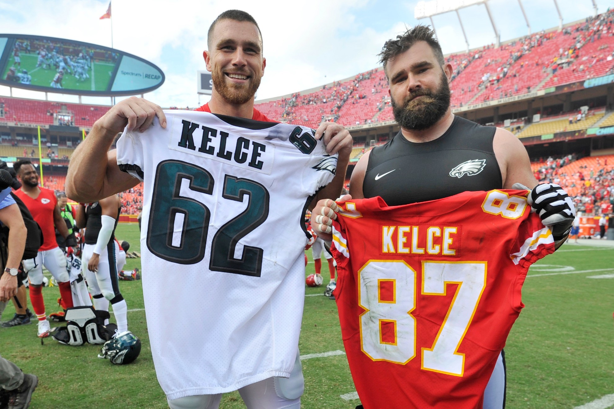 Travis Kelce and his brother Jason Kelce exchange jerseys following an NFL