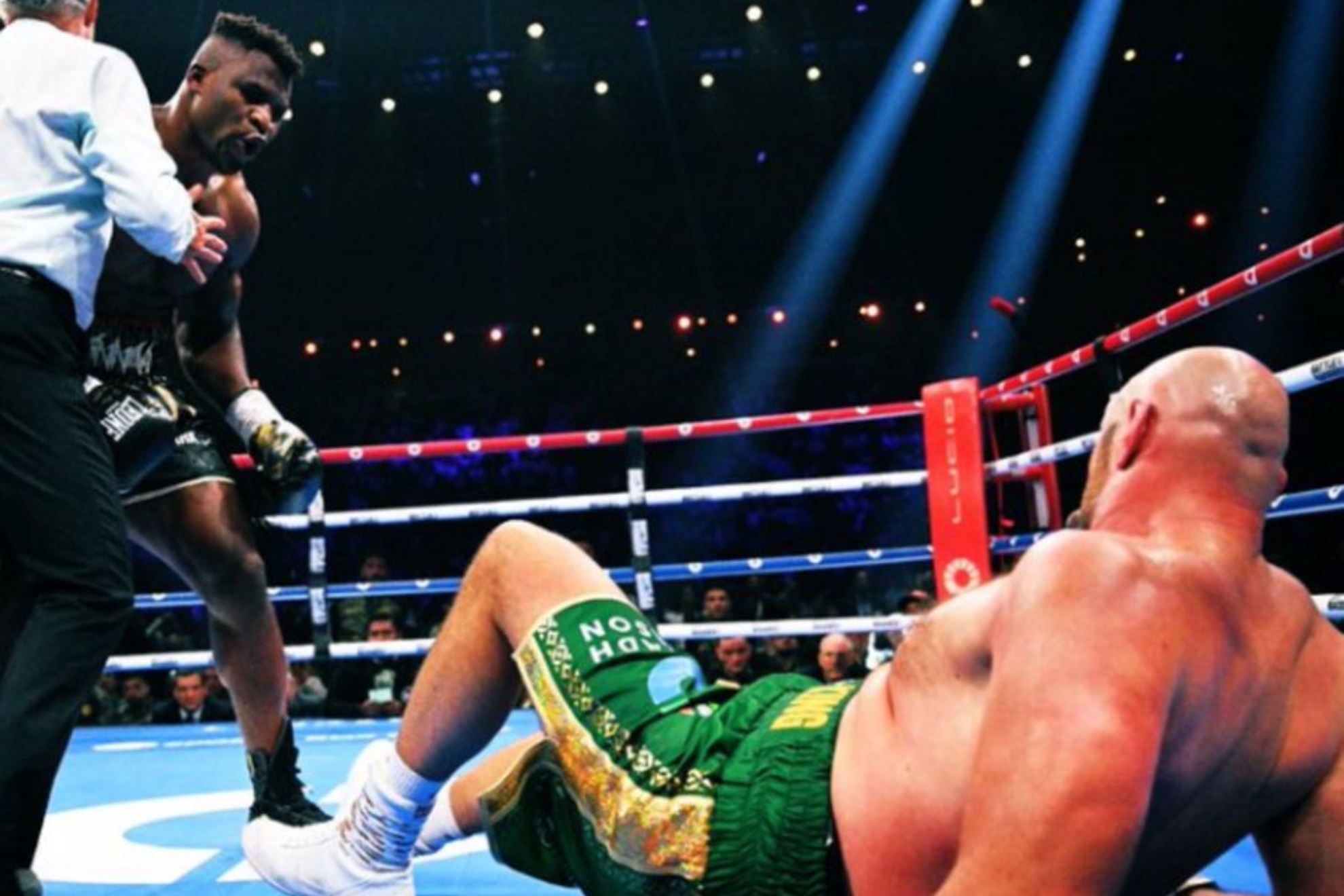 Francis Ngannou knocks Tyson Fury down