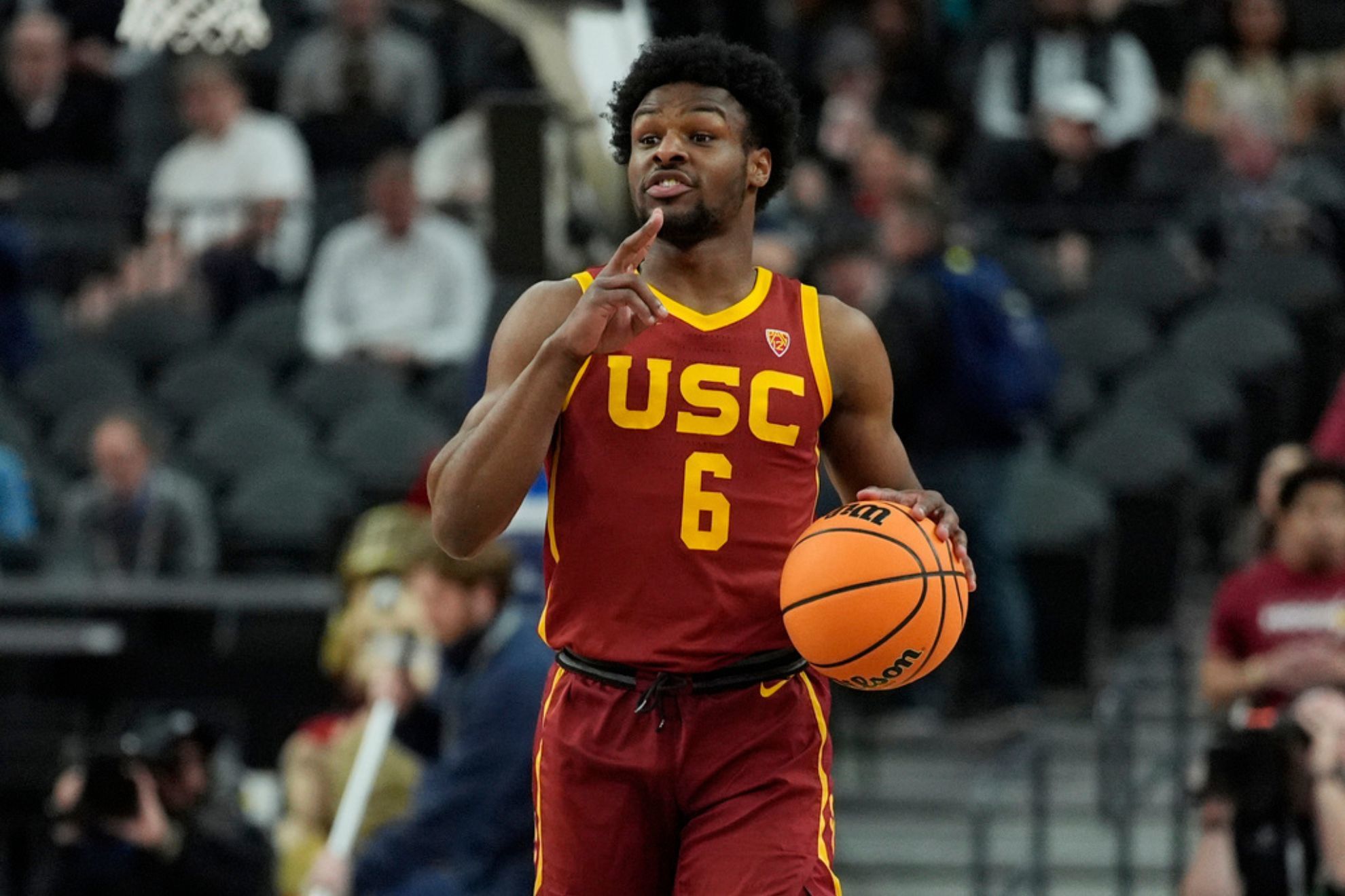 Bronny James will most likely stay another year at USC to raise his draft stock