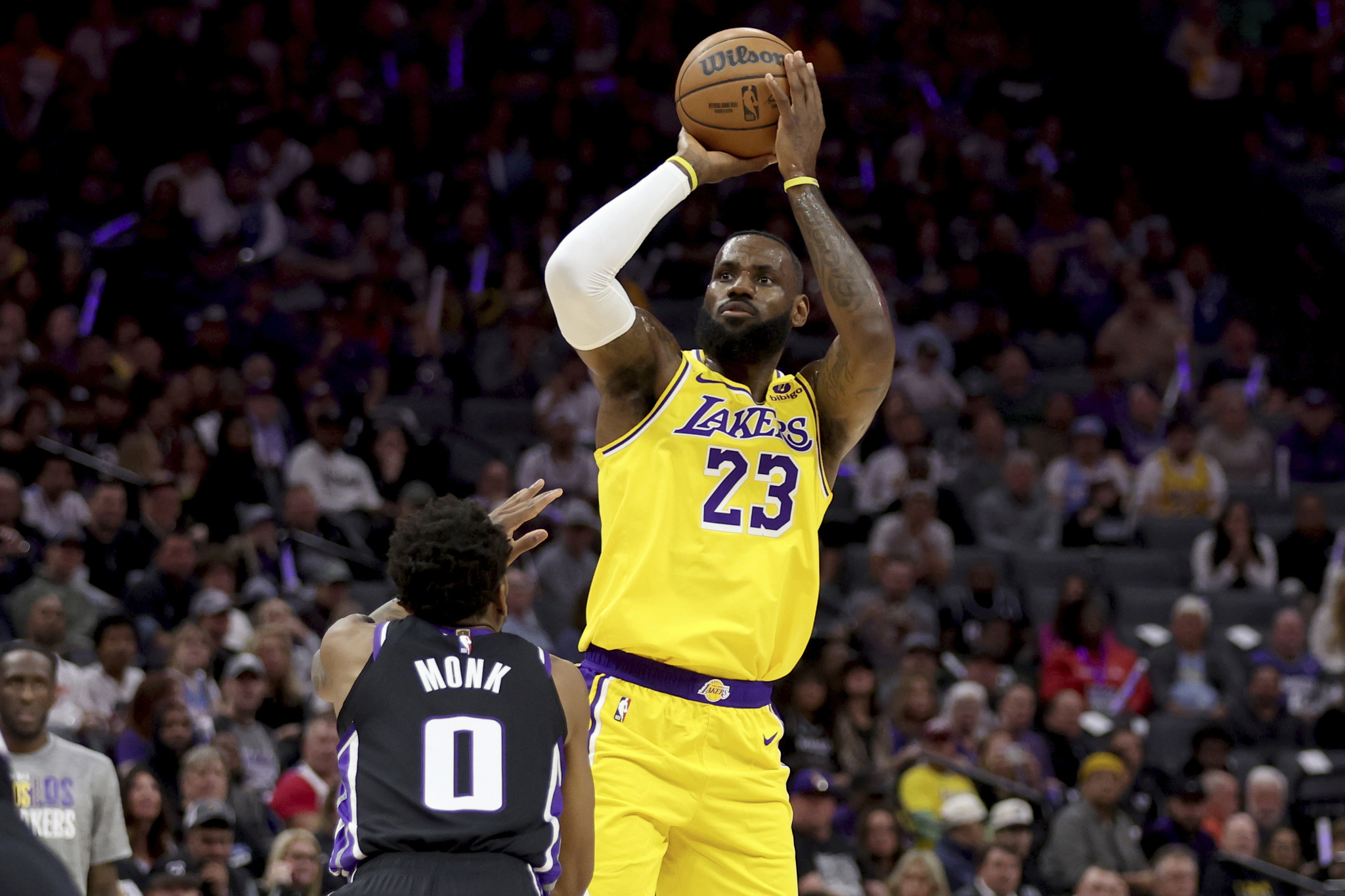 Los Angeles Lakers forward  lt;HIT gt;LeBron lt;/HIT gt; James (23) shoots against Sacramento Kings guard Malik Monk (0) during the first half of an NBA basketball game in Sacramento, Calif, Wednesday, March 13, 2024. (AP Photo/Jed Jacobsohn)