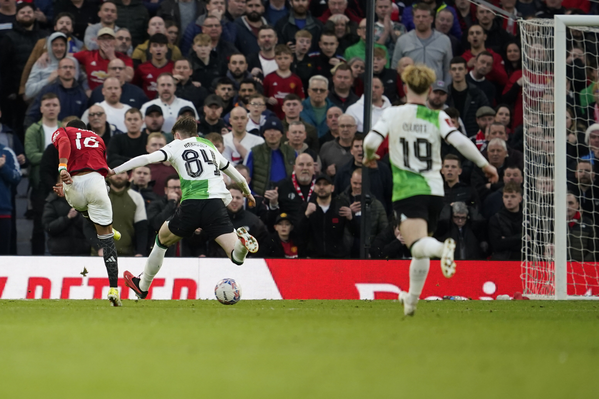 Amad Diallo, left, scores Manchester Uniteds fourth goal during the FA Cup quarterfinal