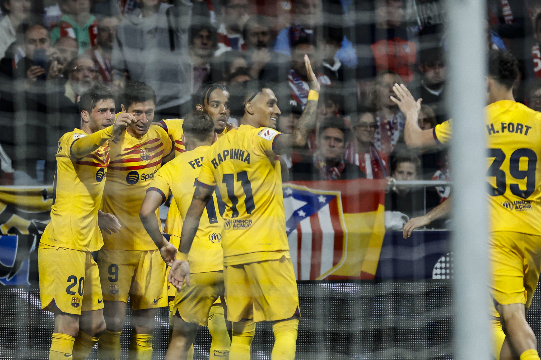 Barcelona celebrate after Robert Lewandowski extends their lead to 2-0