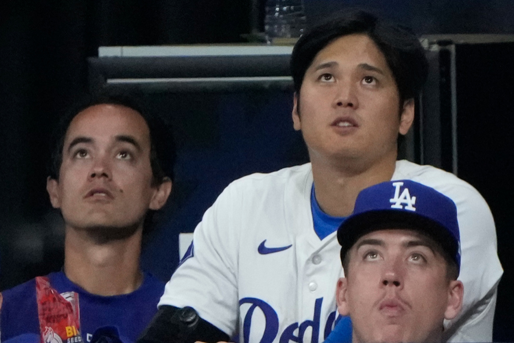 Shohei Ohtani, top right, and interpreter Will Ireton (L) at the game against the SD Padres.