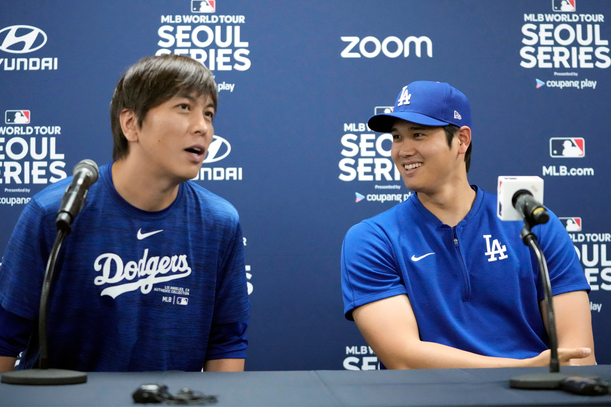 Mizuhara (left) and Ohtani (right) at a news conference, days before the formers dismissal from the Dodgers.