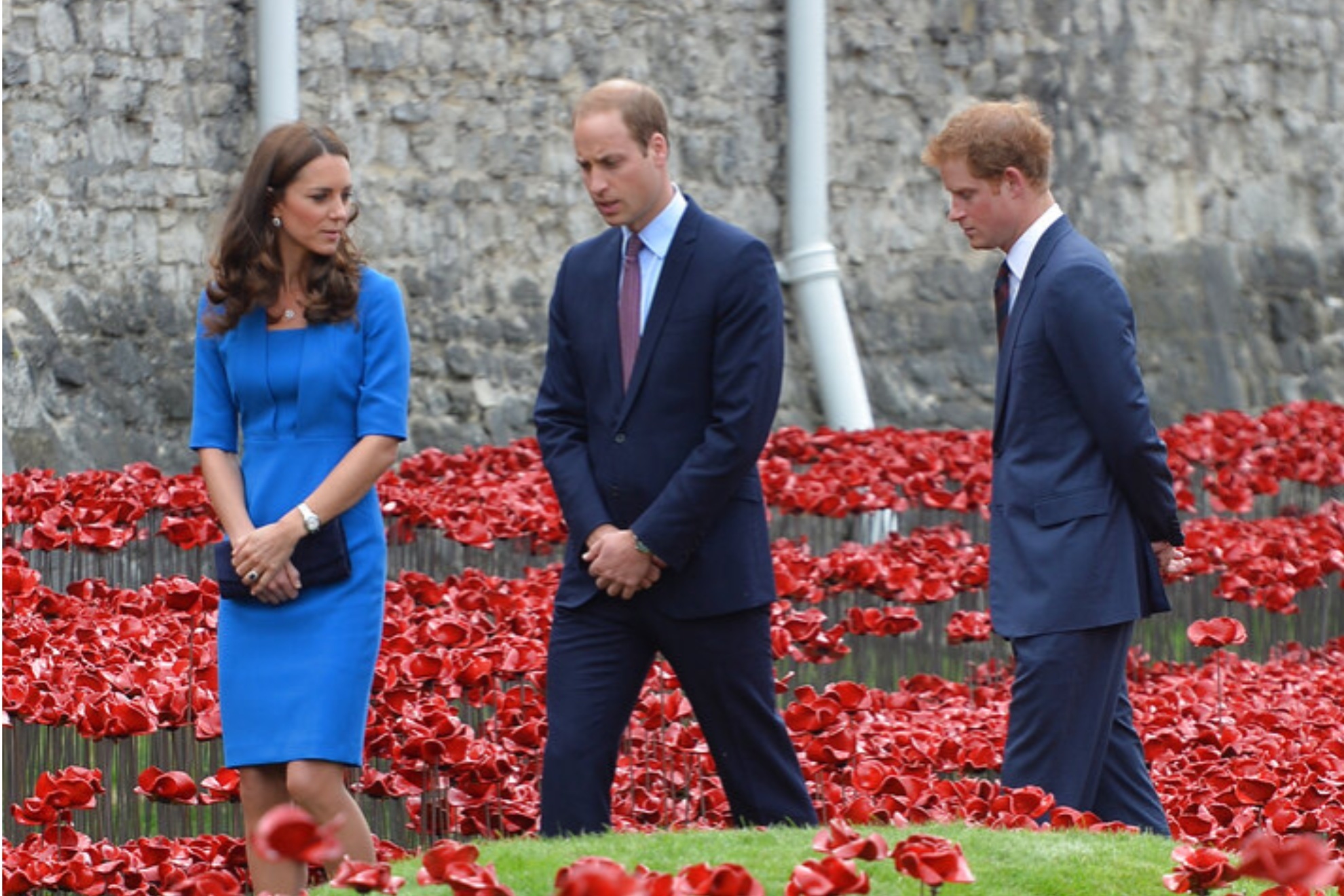 From left, Kate Middleton, Prince William, and Prince Harry in 2014 commemorating the 100th anniversary of the outbreak of WWI.