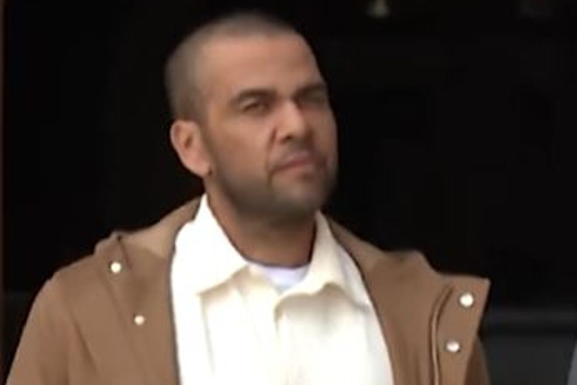 Dani Alves attends his first court appearance after being released on bail; receives insults