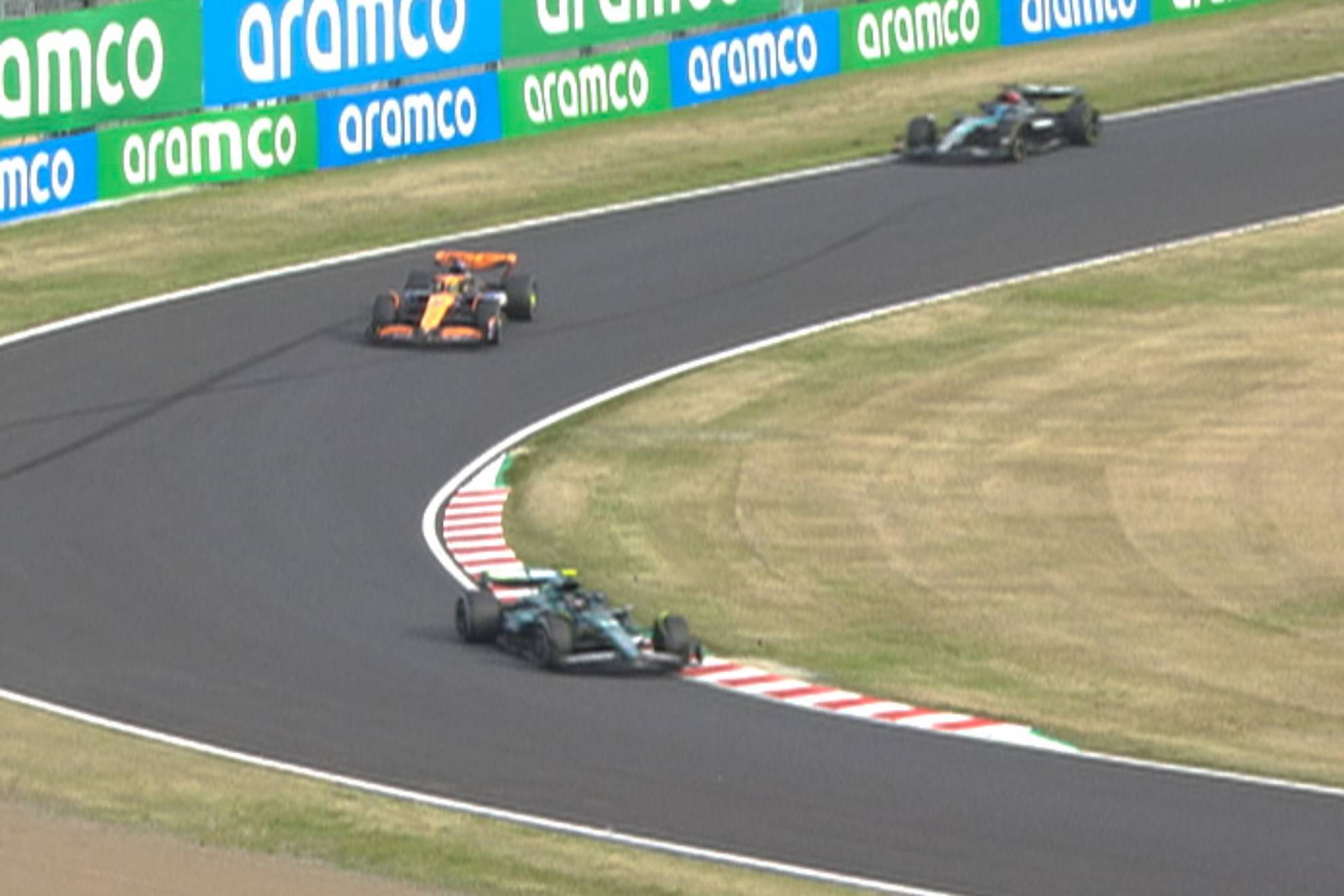 Alonso, Piastri y Russell, en las vueltas finales del GP de Japn.