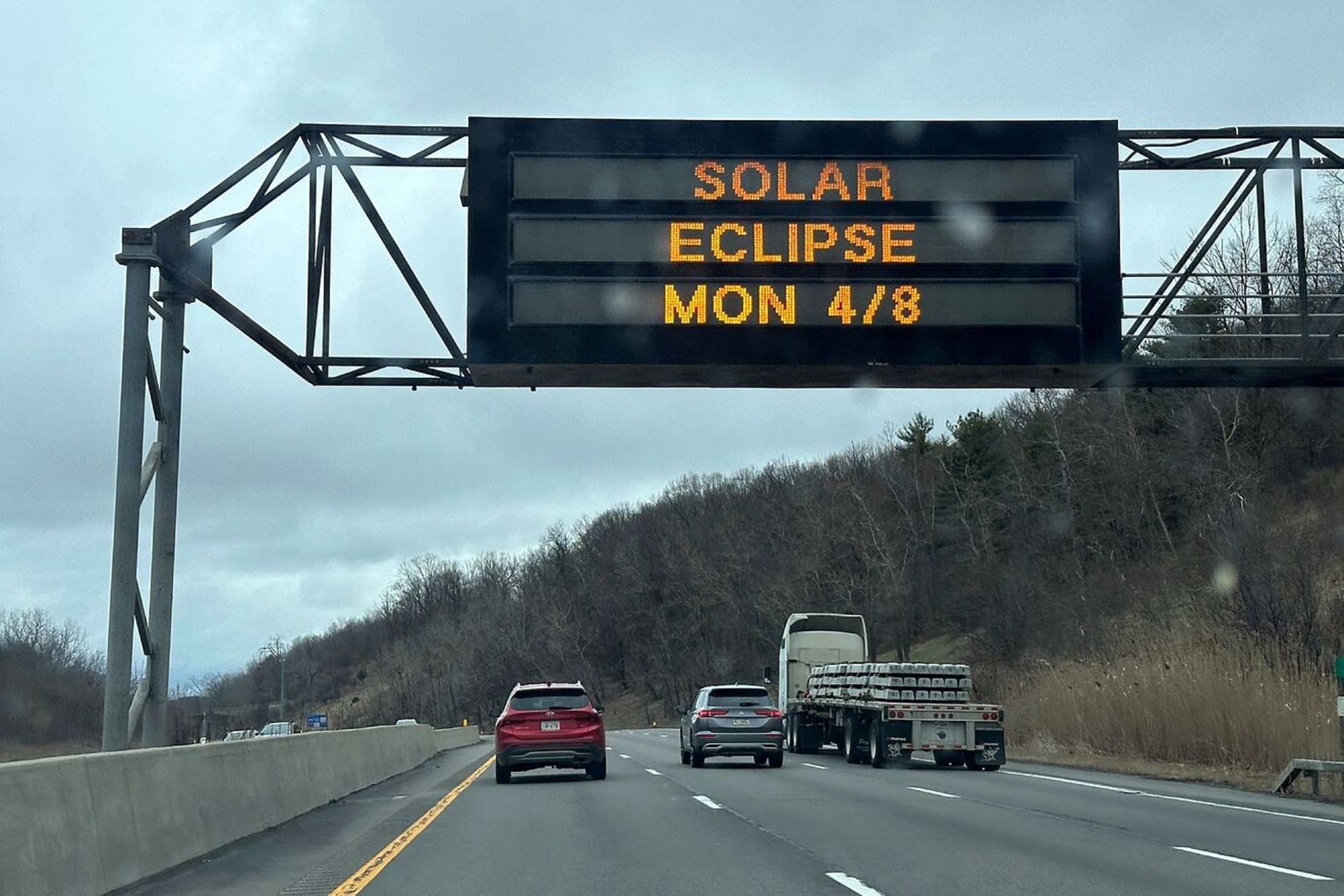 A solar eclipse sign is located on Interstate 81 in Binghamton, New York, whose highway leads to areas where the eclipse will be total.