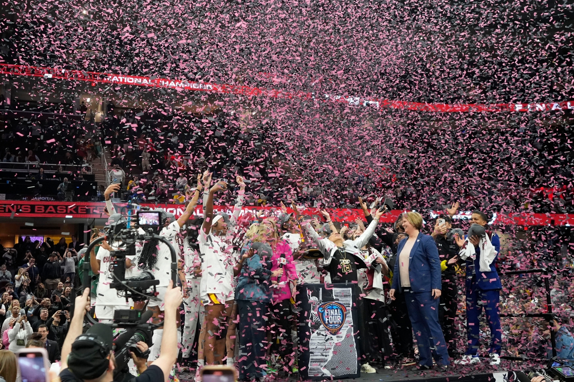 South Carolina players and coach celebrate after the Final Four college basketball championship game against Iowa in the womens NCAA Tournament
