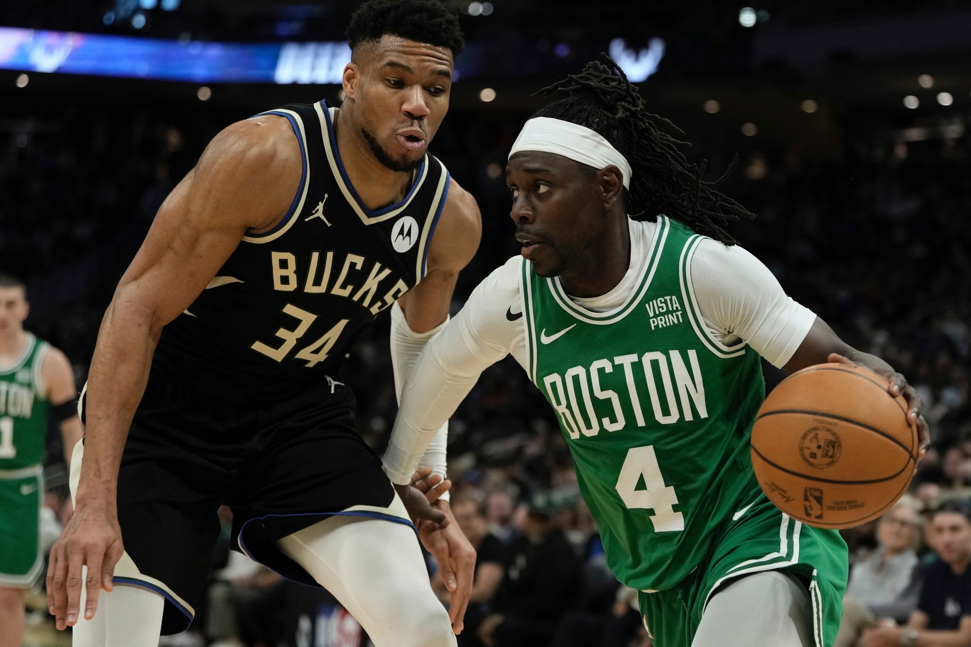 Boston Celtics Jrue Holiday gets past Milwaukee Bucks Giannis Antetokounmpo