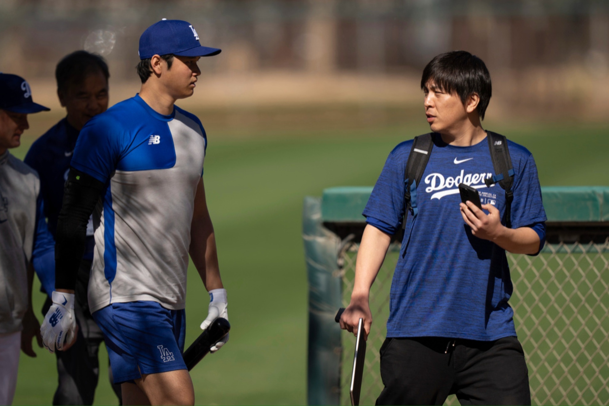 Shohei Ohtani and Ippei Mizuhara at batting practice during spring training in Phoenix.