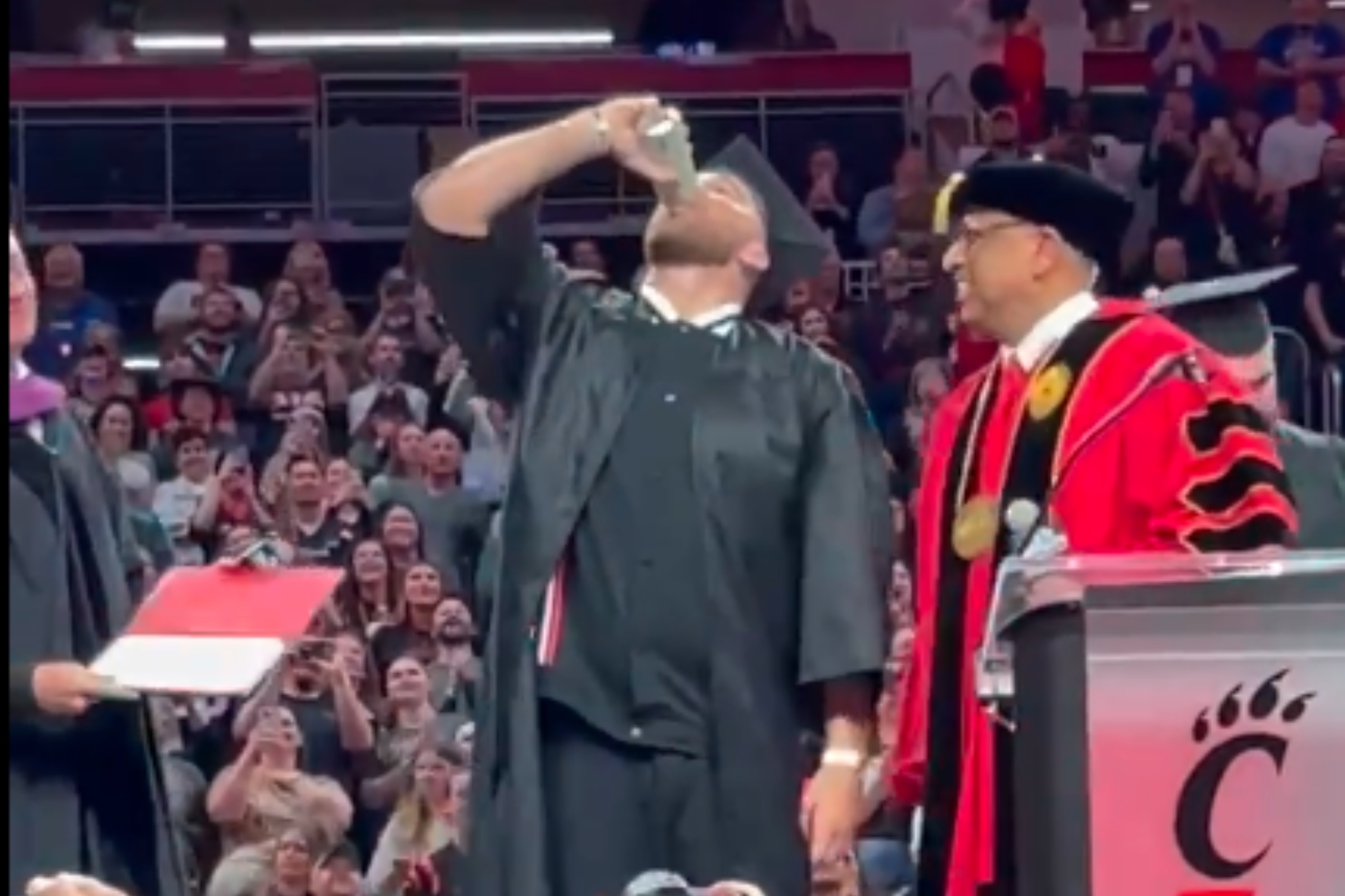Travis Kelce graduation beer chug analyzed by body language expert claiming hes in a state of eternal teenager