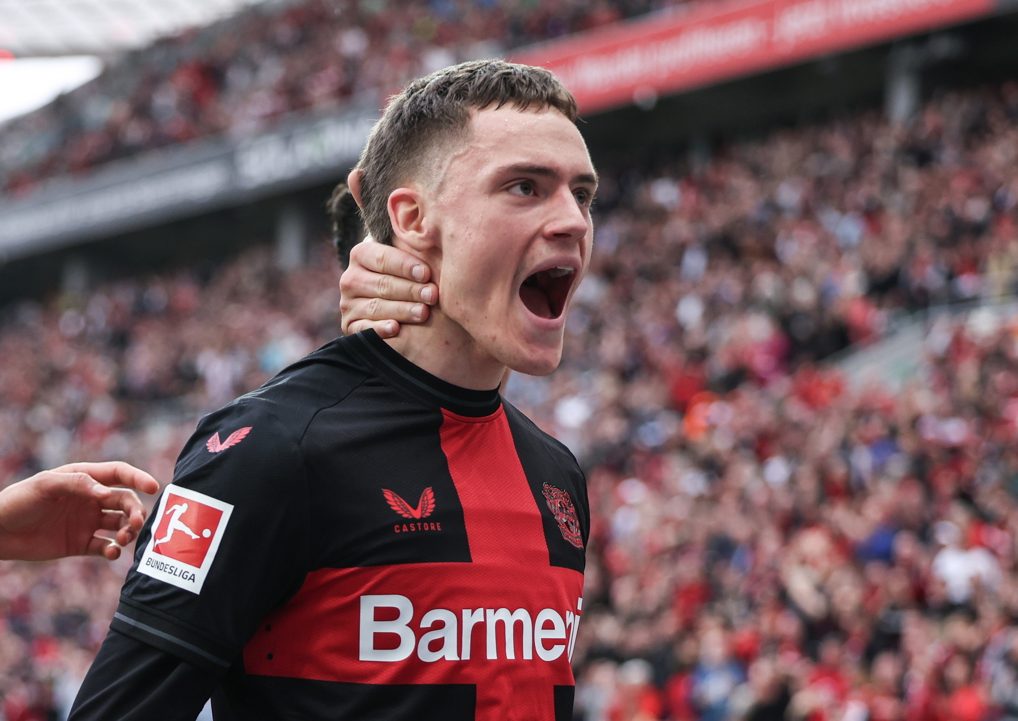 Leverkusens Florian Wirtz celebrates scoring the 3-0 goal